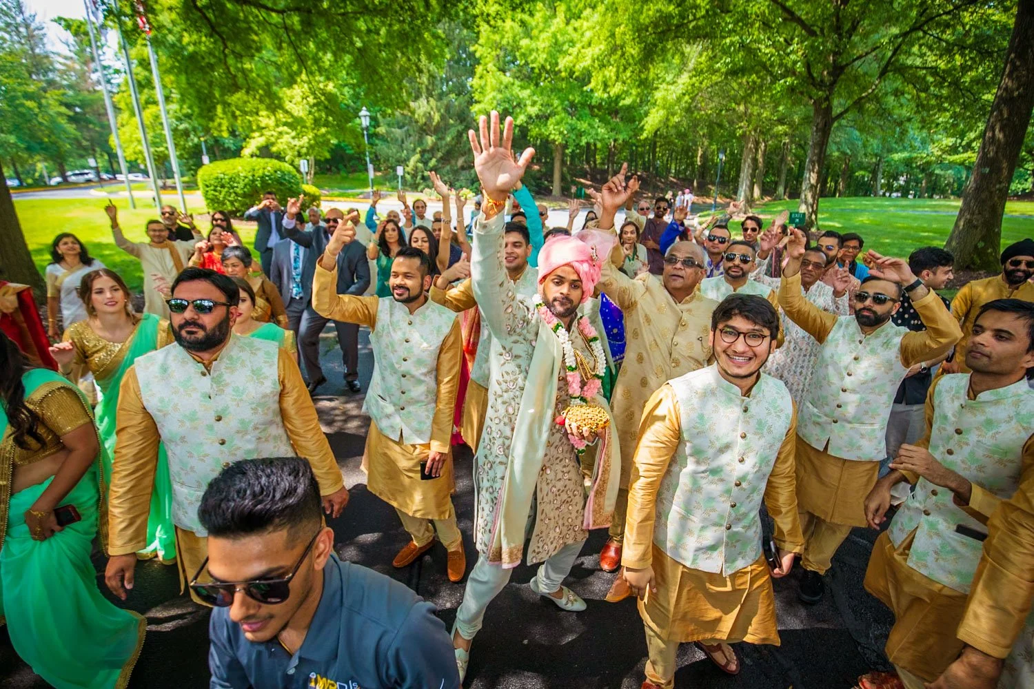 Groom with groomsmen dancing during the baraat in Westfields Marriott Chantilly Virginia entranceway