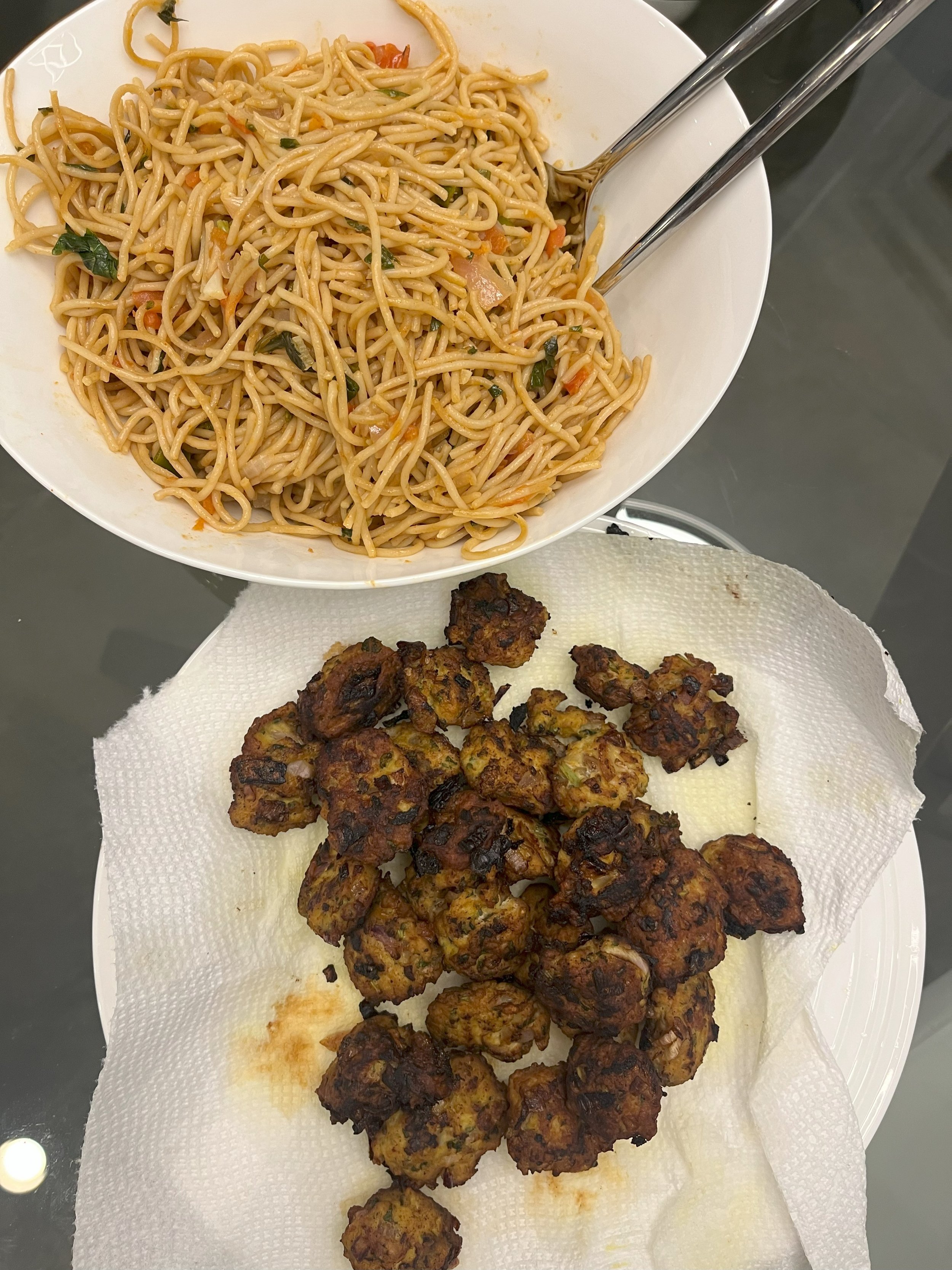 Indian Tadka spices, garlic, red crushed pepper, cherry tomatoes, green chilies with mint and red onion tandoori spiced meatballs