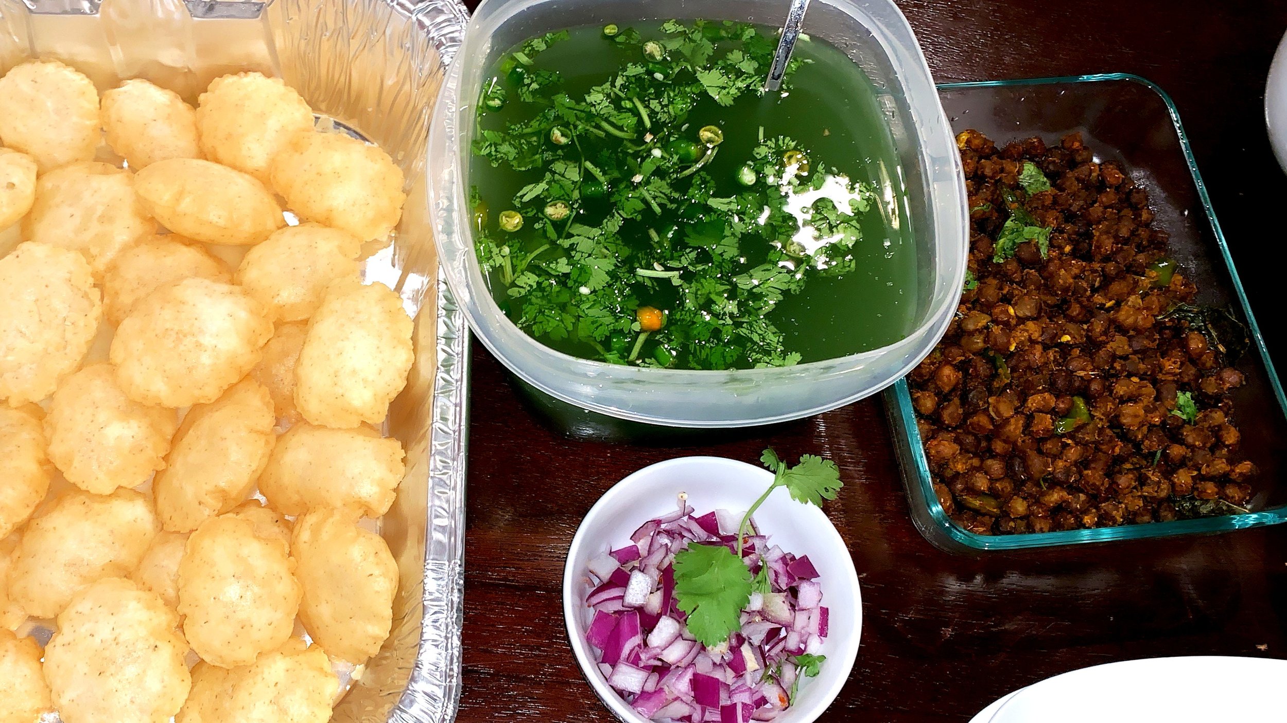 Pani Puri with spicy roasted black Channa stuffing