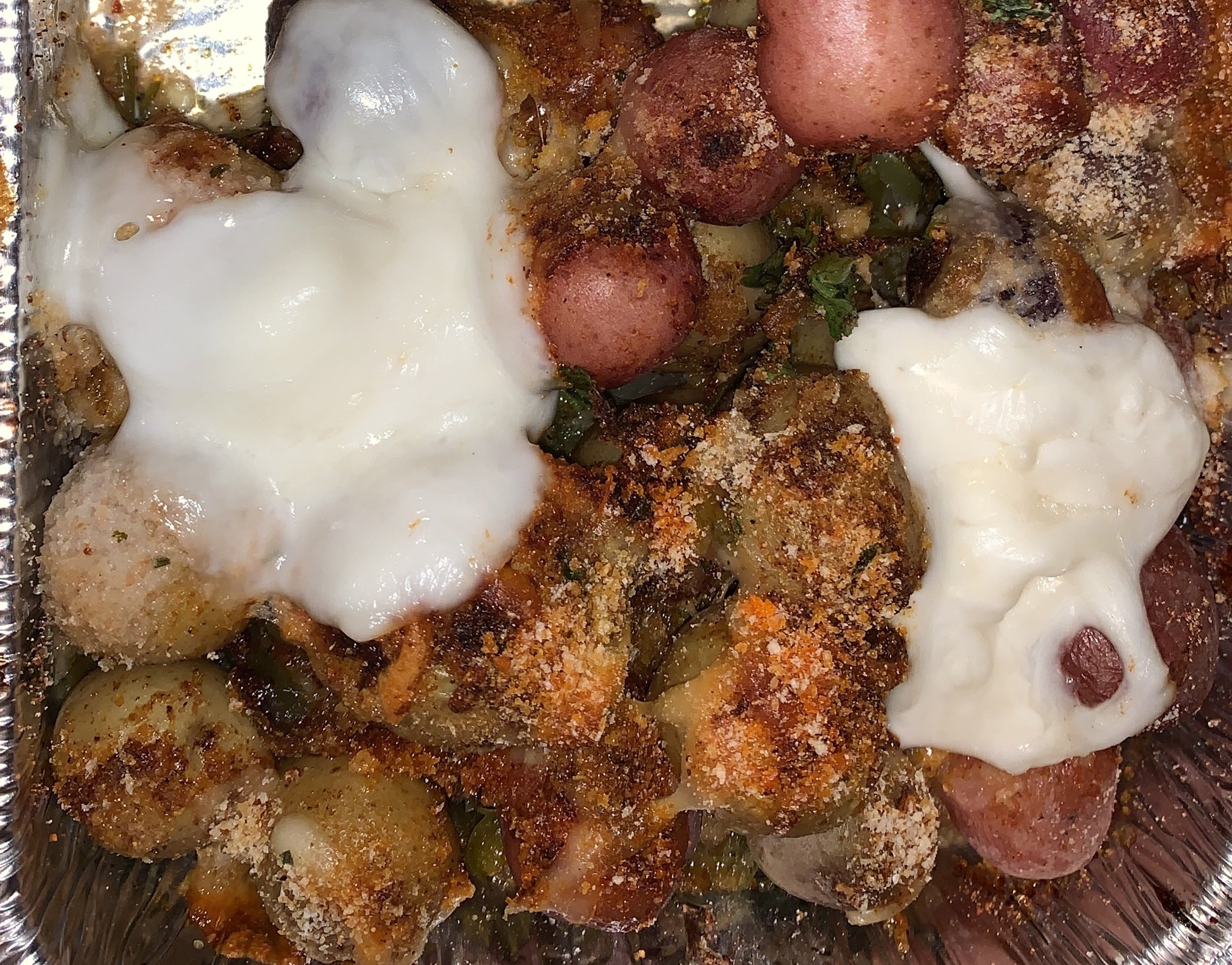 Italian/ Indian roasted potatoes with spicy homemade bread crumbs and mozzarella