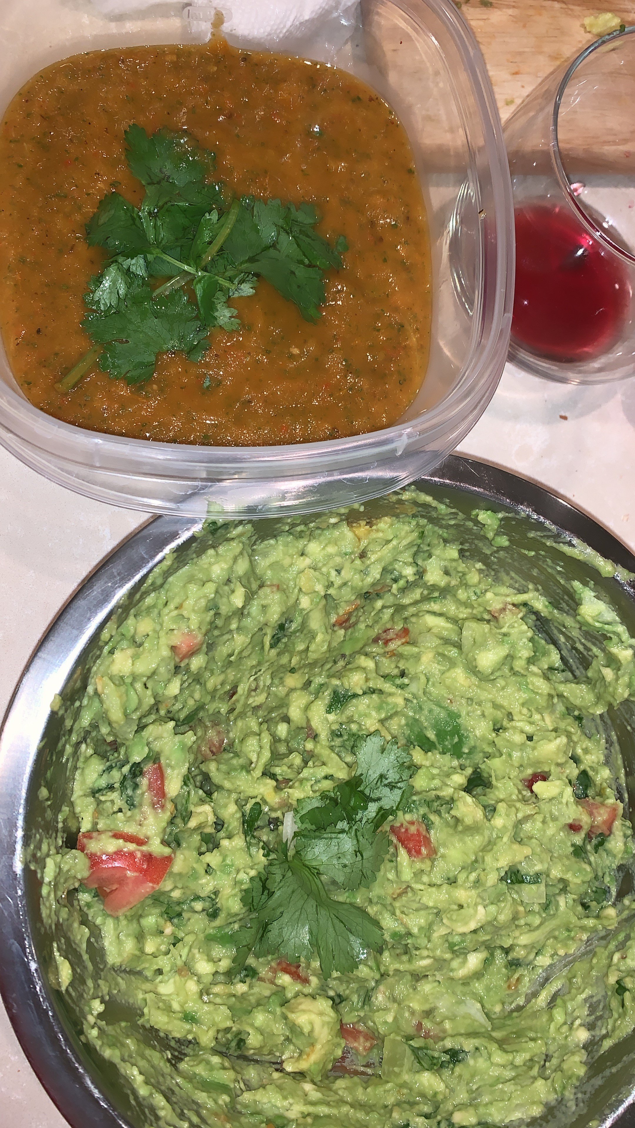 Roasted tomato and onion salsa, blended with fresh onion and tomato as well & Guacamole
