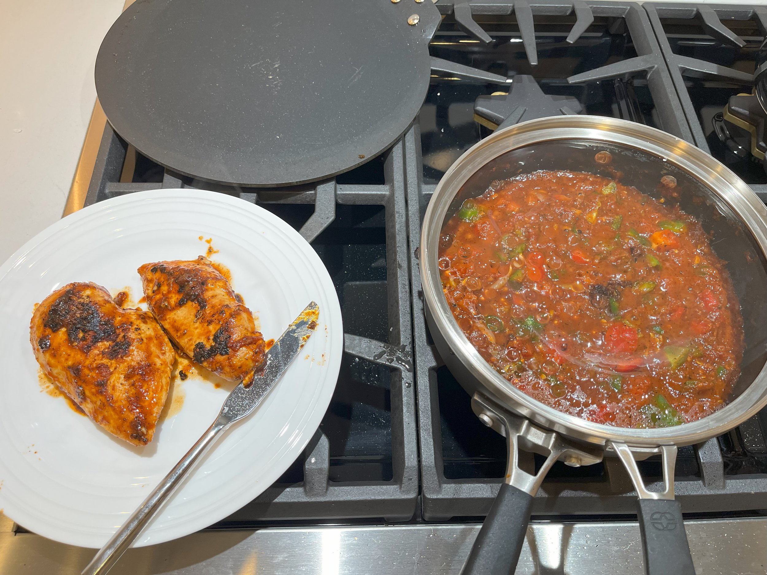 Spicy tomato sauce, Mexican and Indian spiced and sautéed chicken