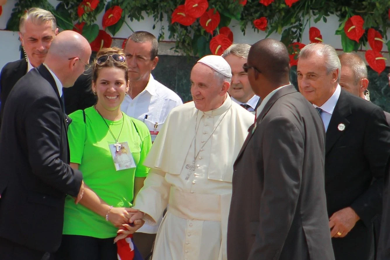  A young shows her emotion while holding Pope Francis’s hand after the mass he held in Holguin.| Photo Credit: Reynaldo Cruz Diaz  
