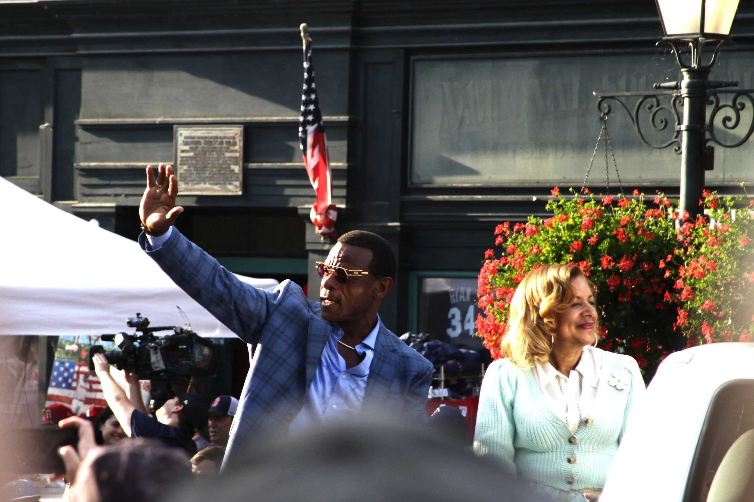 Recently deceased Hall of Famer Rickey Henderson acknowledges the crowd during the 2022 Hall of Fame Weekend parade.| Credit: Reynaldo Cruz Diaz