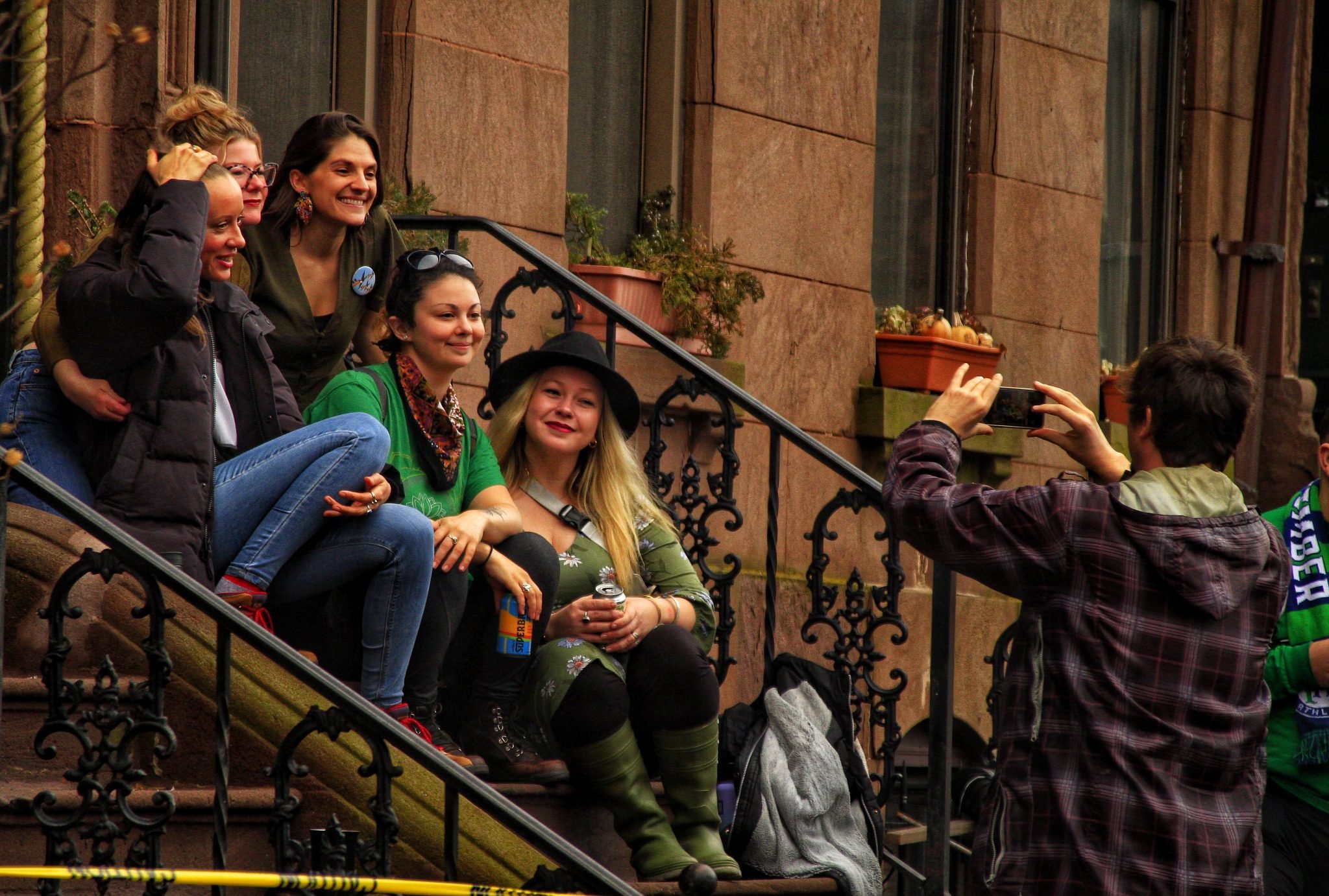 A group of young people stayed behind and took a group photo after the 2022 St. Patrick’s Day parade in Hartford.| Credit: Reynaldo Cruz Diaz