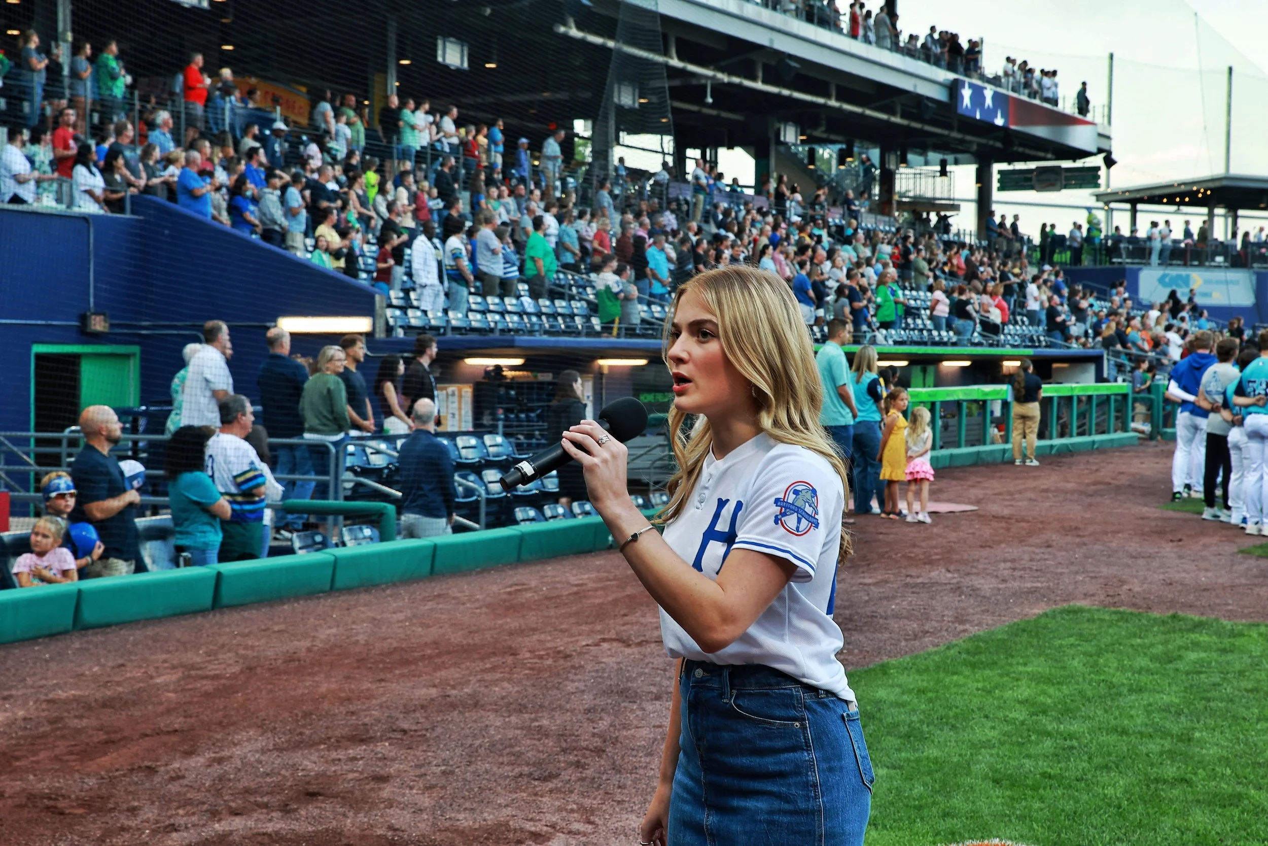 Gracie Percival sings the Star-Spangled Banner prior to Cuban Heritage Night.| Credit: Reynaldo Cruz Diaz