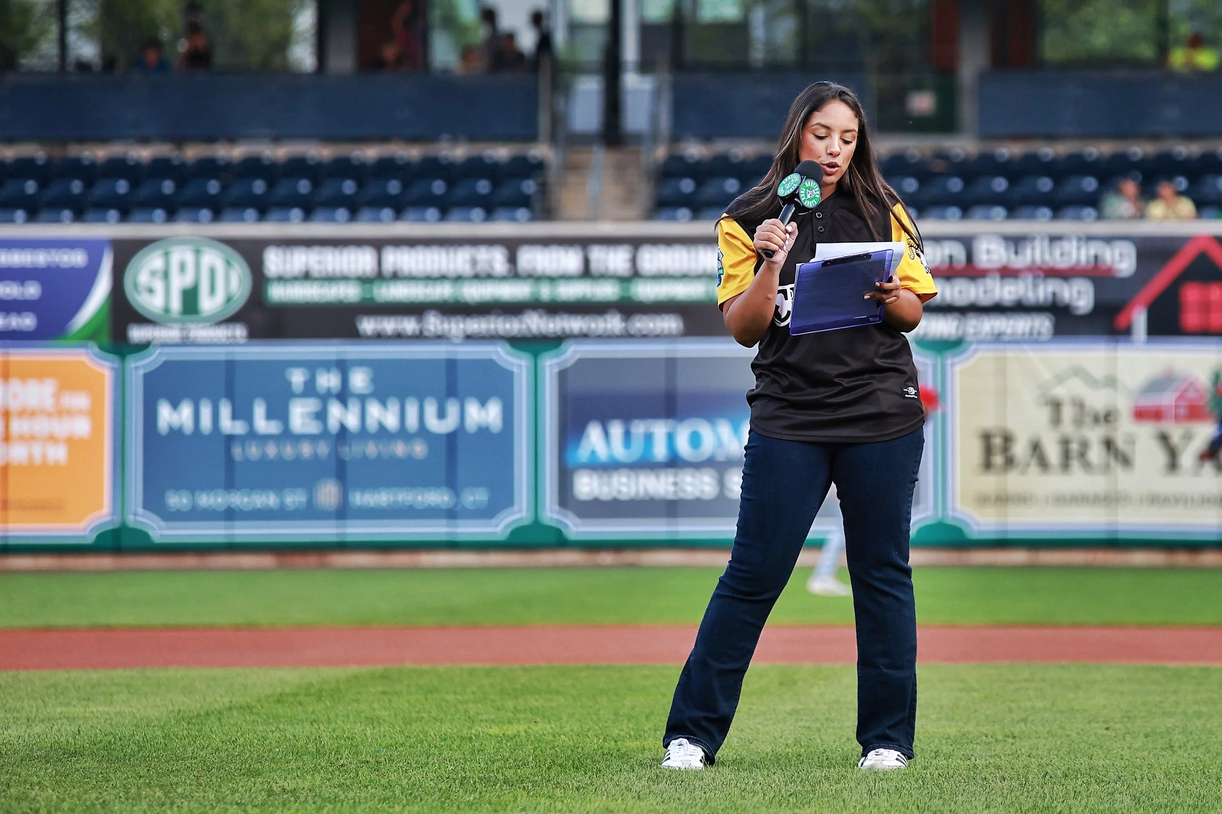 Melaney Castro makes announcements in Spanish during the pregame ceremonies of Cuban Heritage Night.| Credit: Reynaldo Cruz Diaz