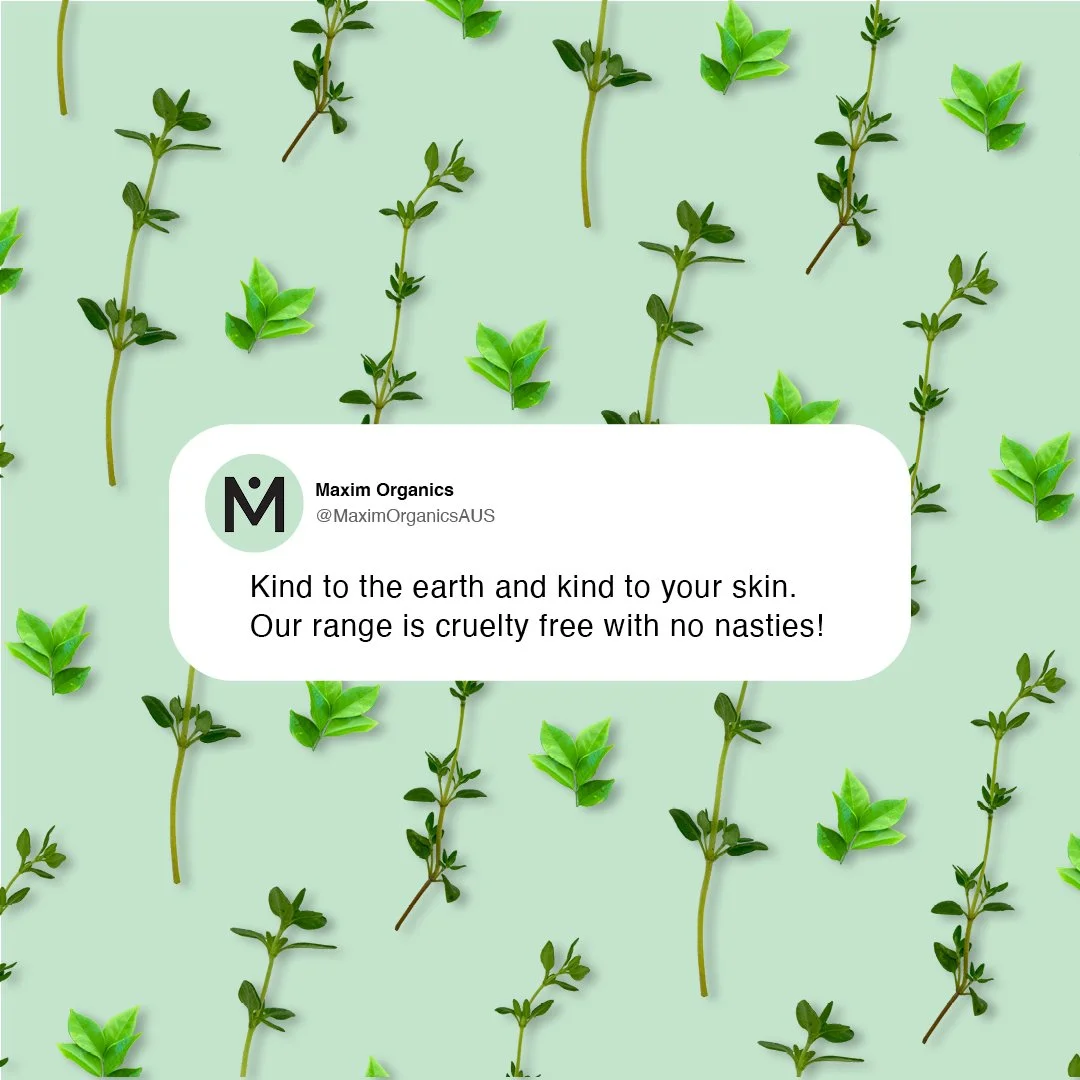 Background with green sprigs and leaves scattered around. Overlaid text from Maxim Organics promoting cruelty-free products that are gentle on the earth and skin.
