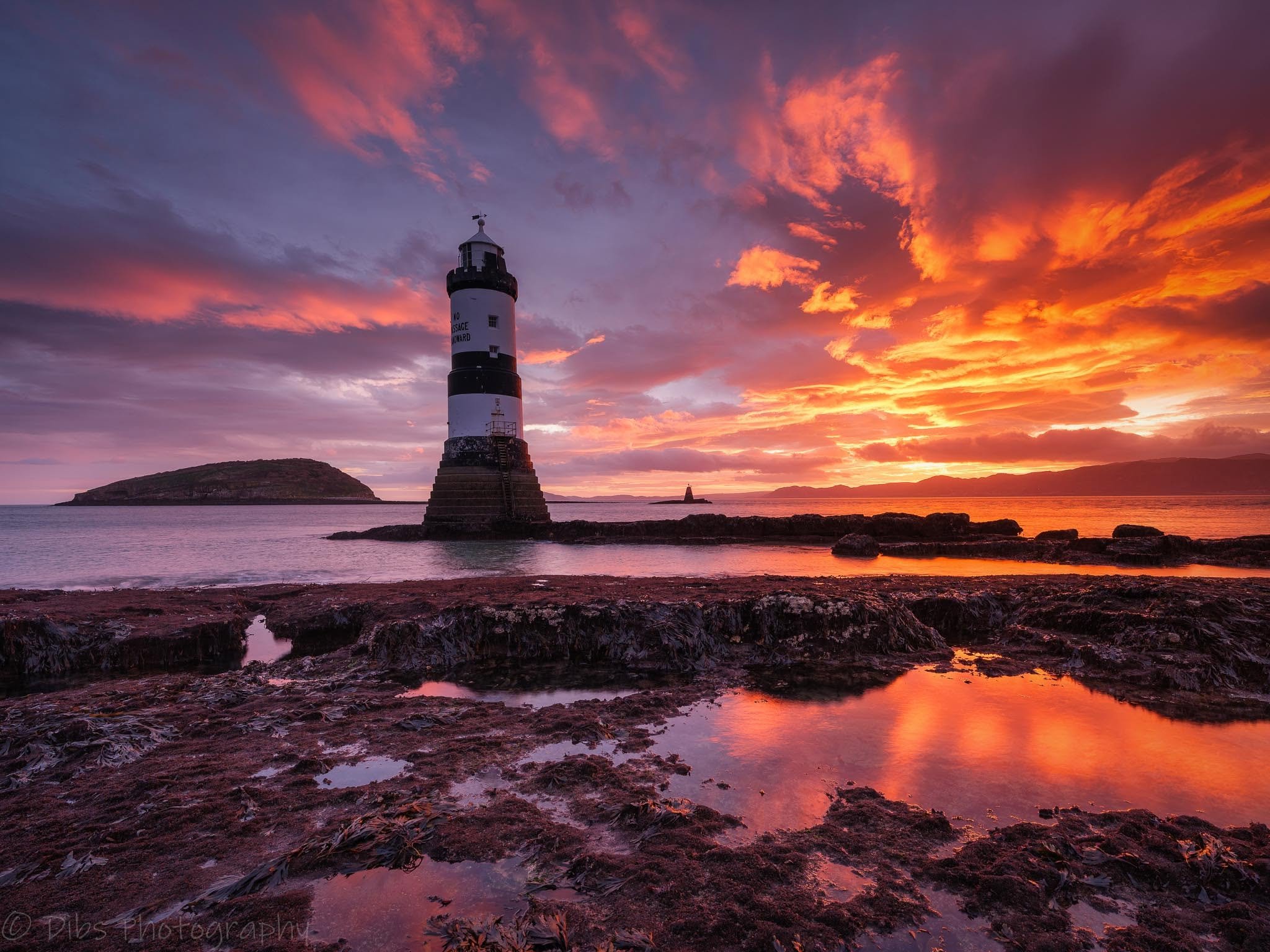 Penmon Lighthouse at sunset on the Anglesey coast