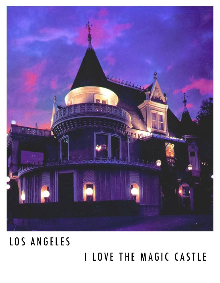A photo of Disneyland's iconic Sleeping Beauty Castle in Los Angeles at dusk with purple and pink sky, illuminated windows, and decorative towers.