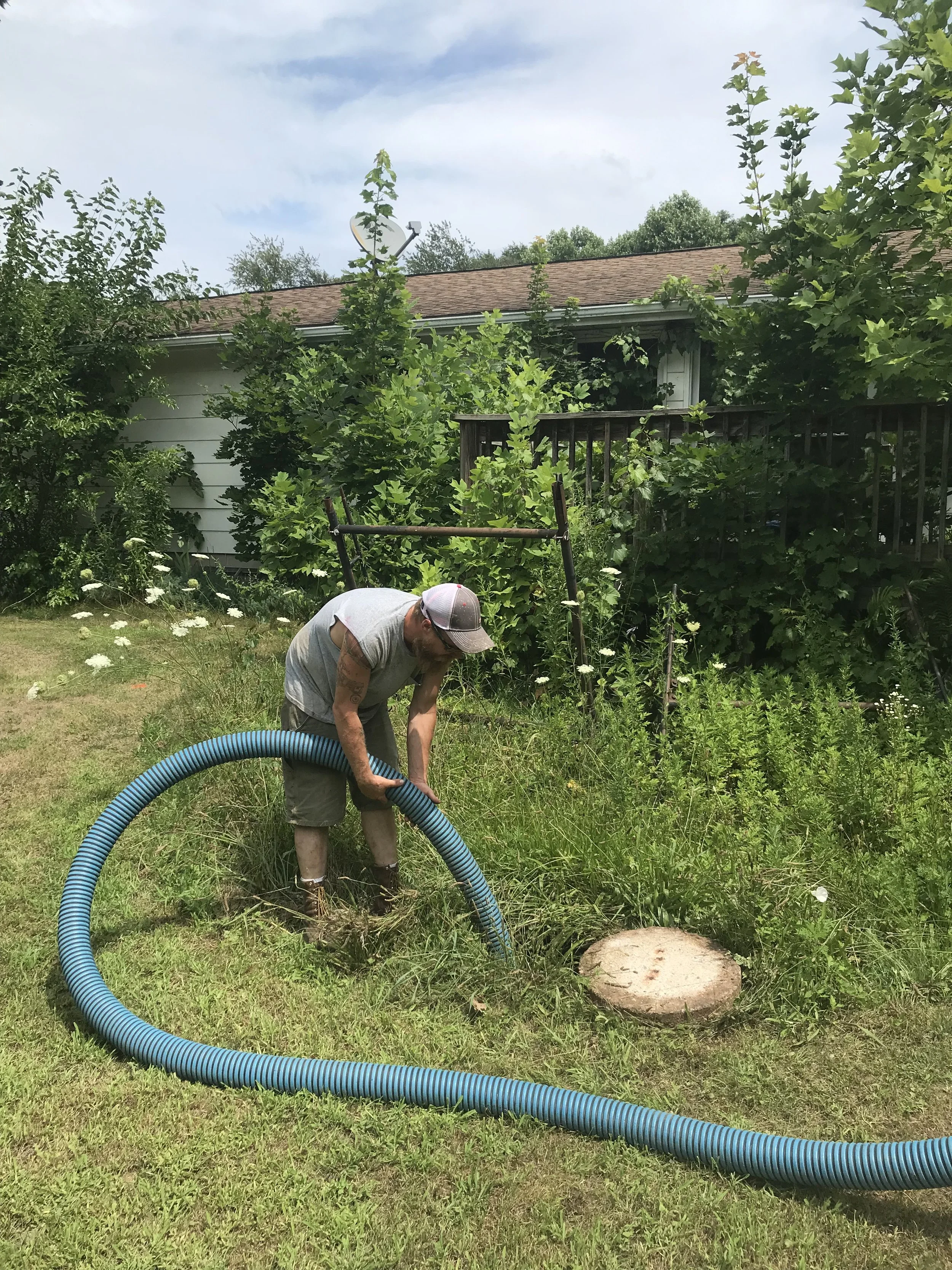 K-FEX employee pumping out a septic in Walkerton Indiana