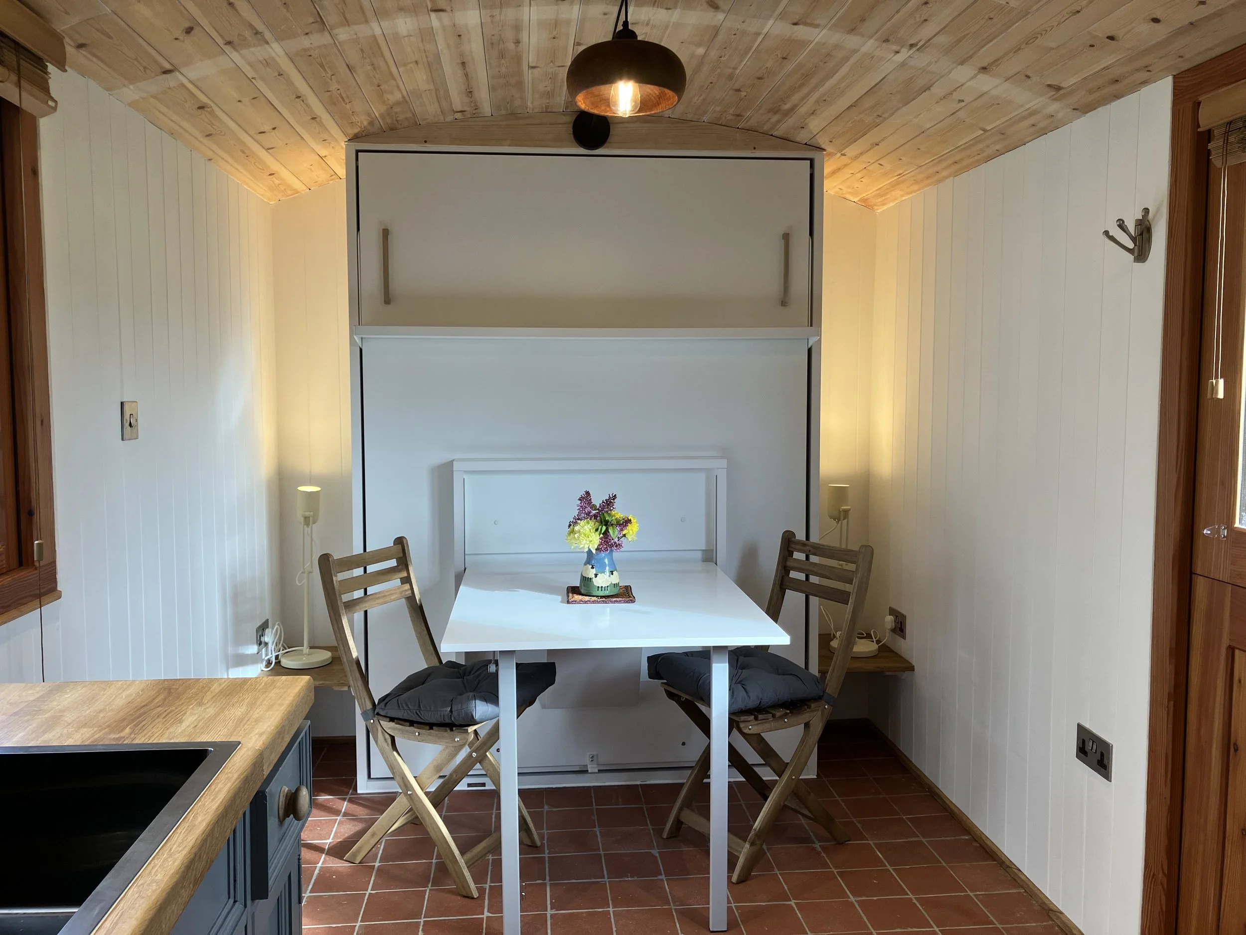 fouldout table with chairs