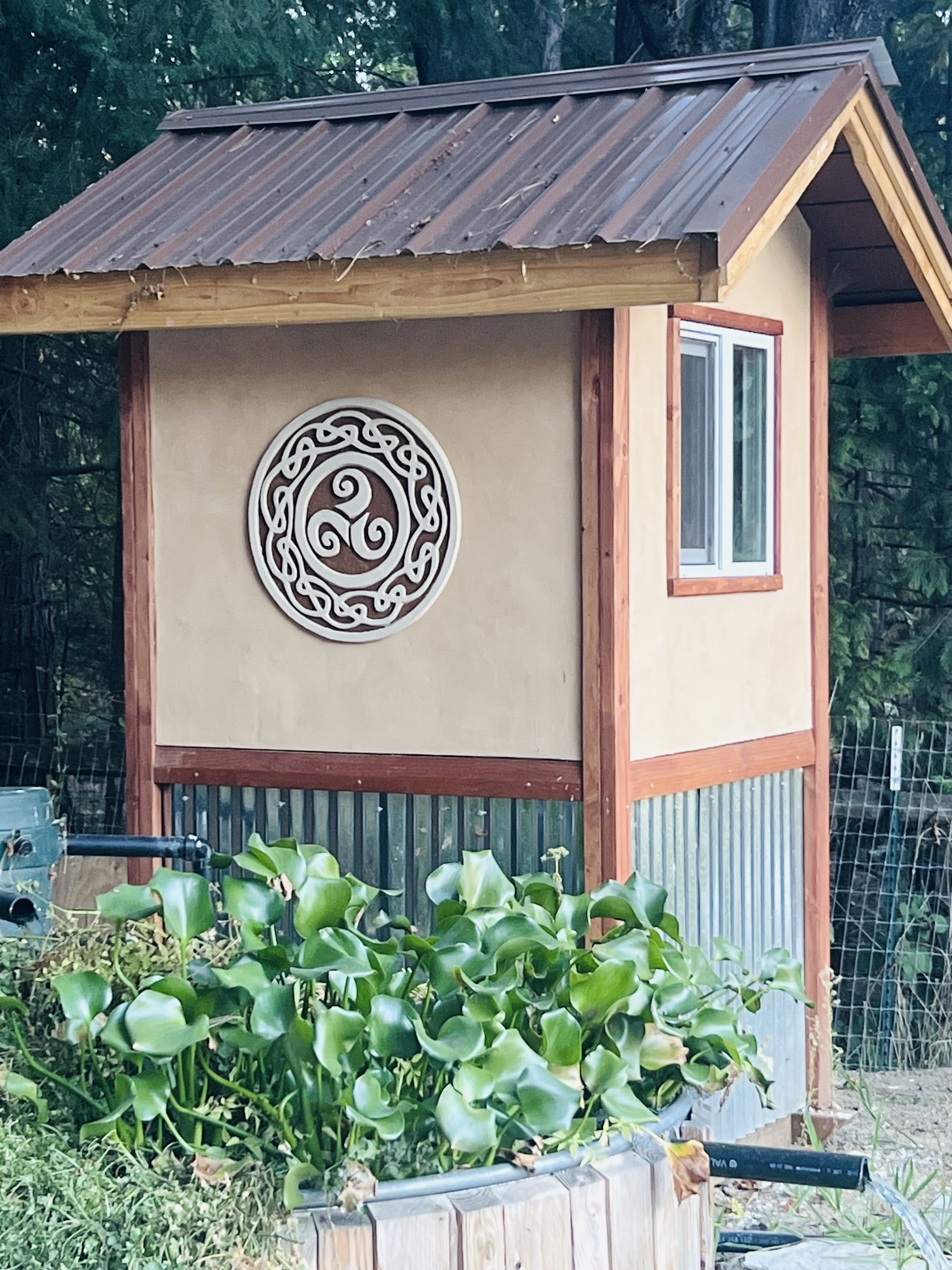 Pump house earthen scaffito sculpture garden art.jpg