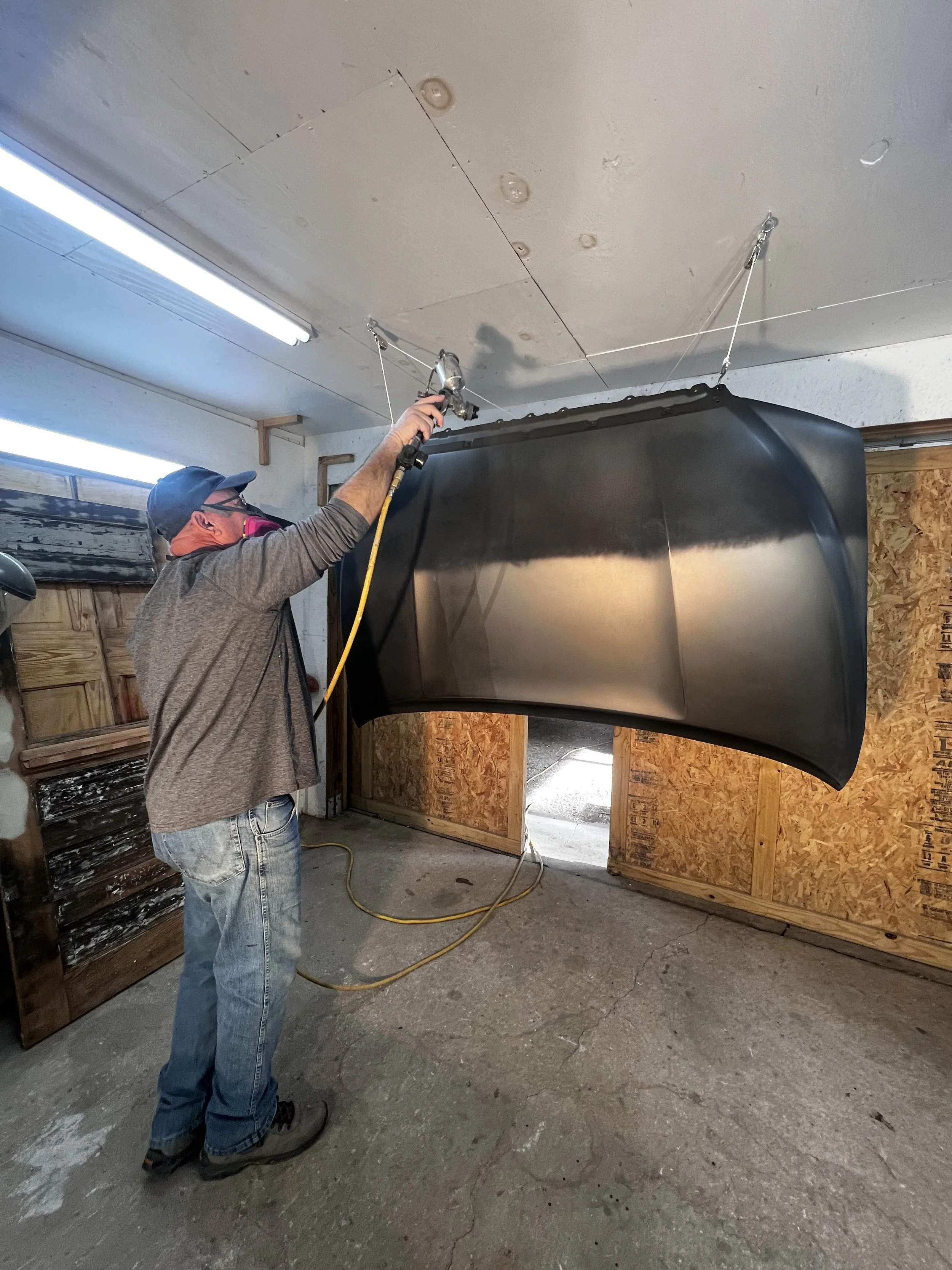 Man painting Car Hood