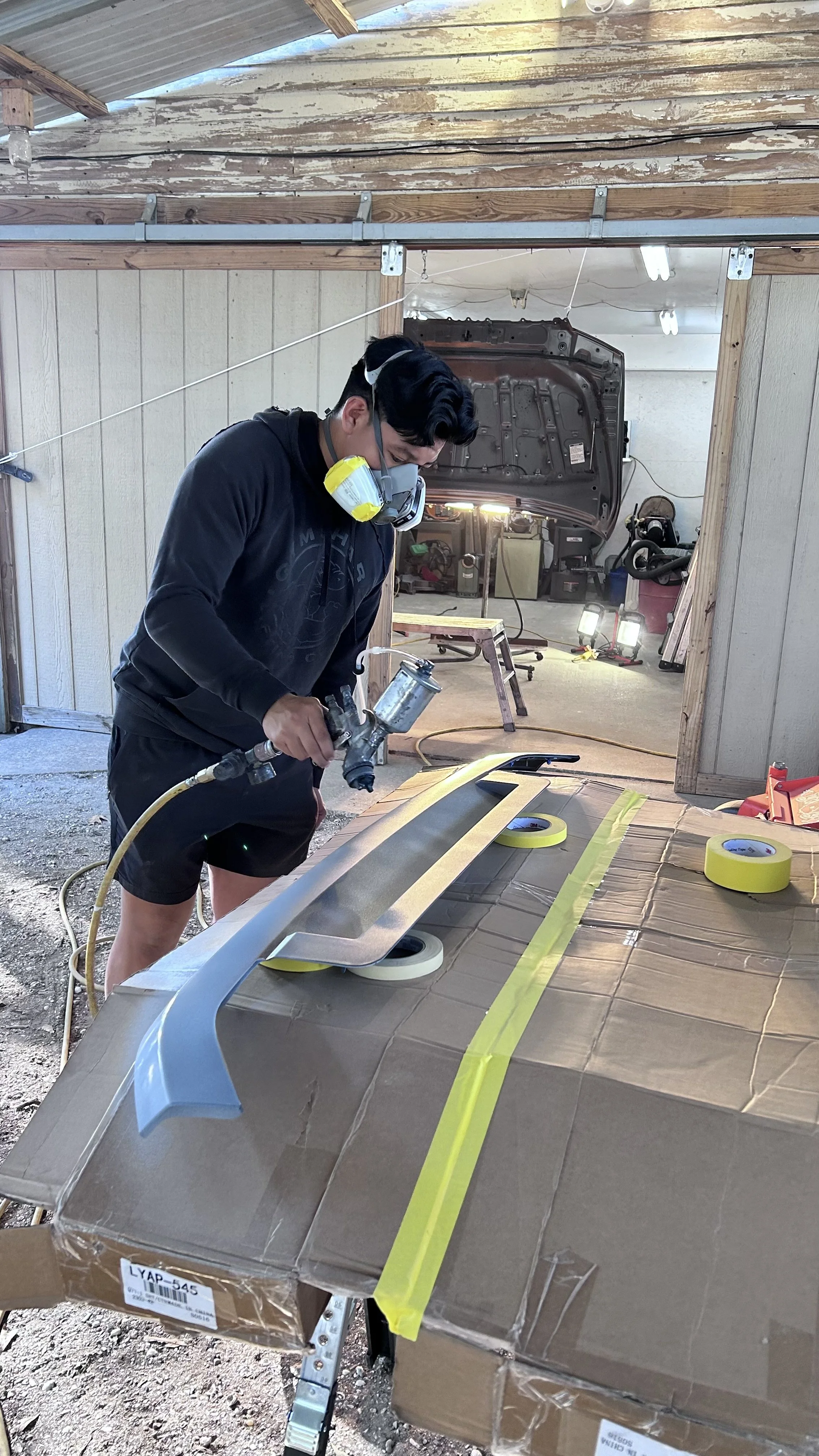 Man Repairing Camper Roof