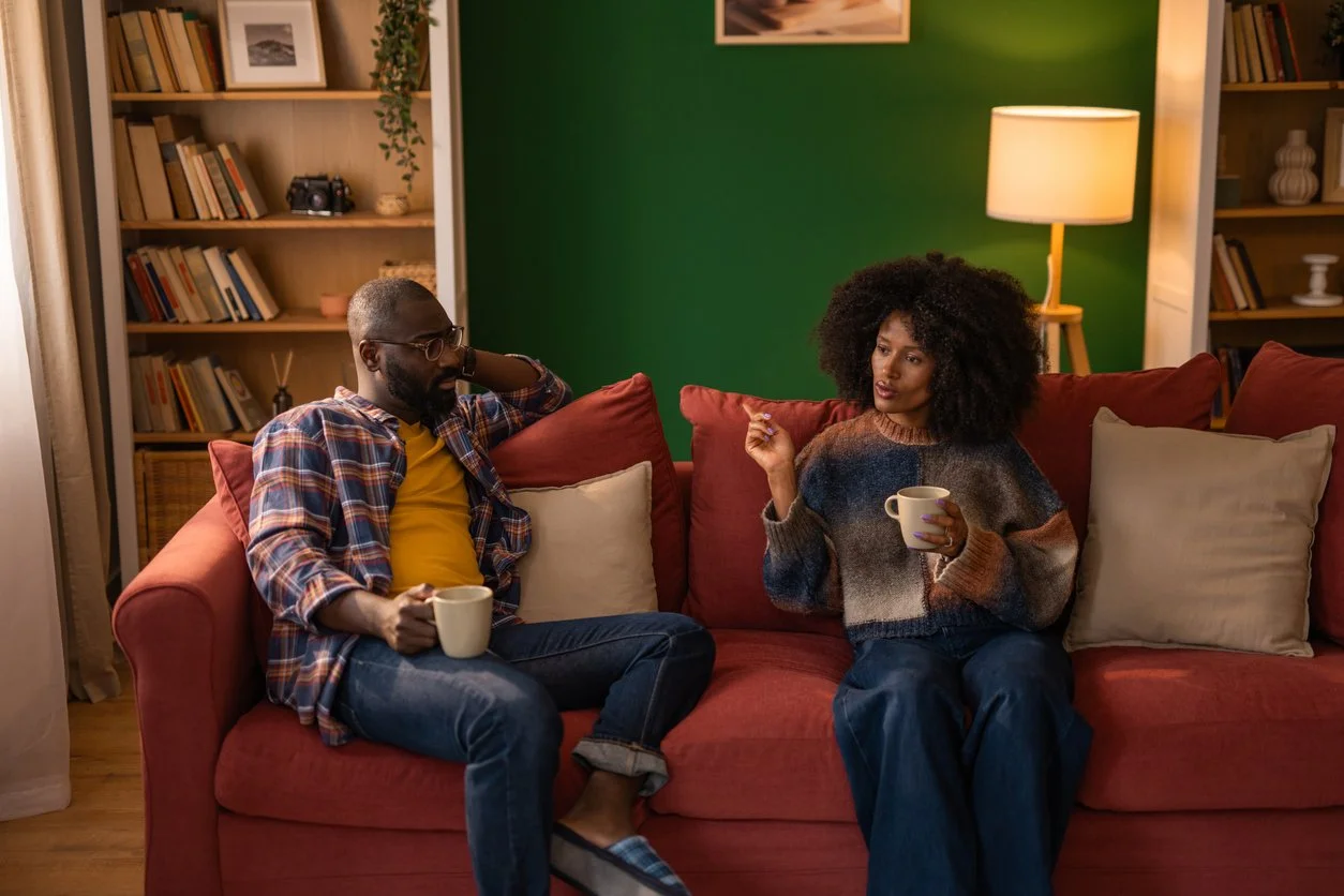 Married couple discussing their emotional needs and overcoming roommate syndrome.