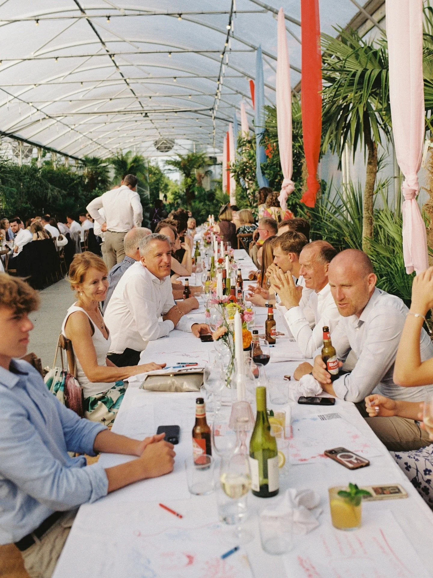 I love an unconventional venue and I love tropical plants so I felt a bit like a kid running around these greenhouses! The choice of colours for the decor really complemented all the greenery 🌸

Captured on 35mm and 120 film

Venue @archiplantsevent