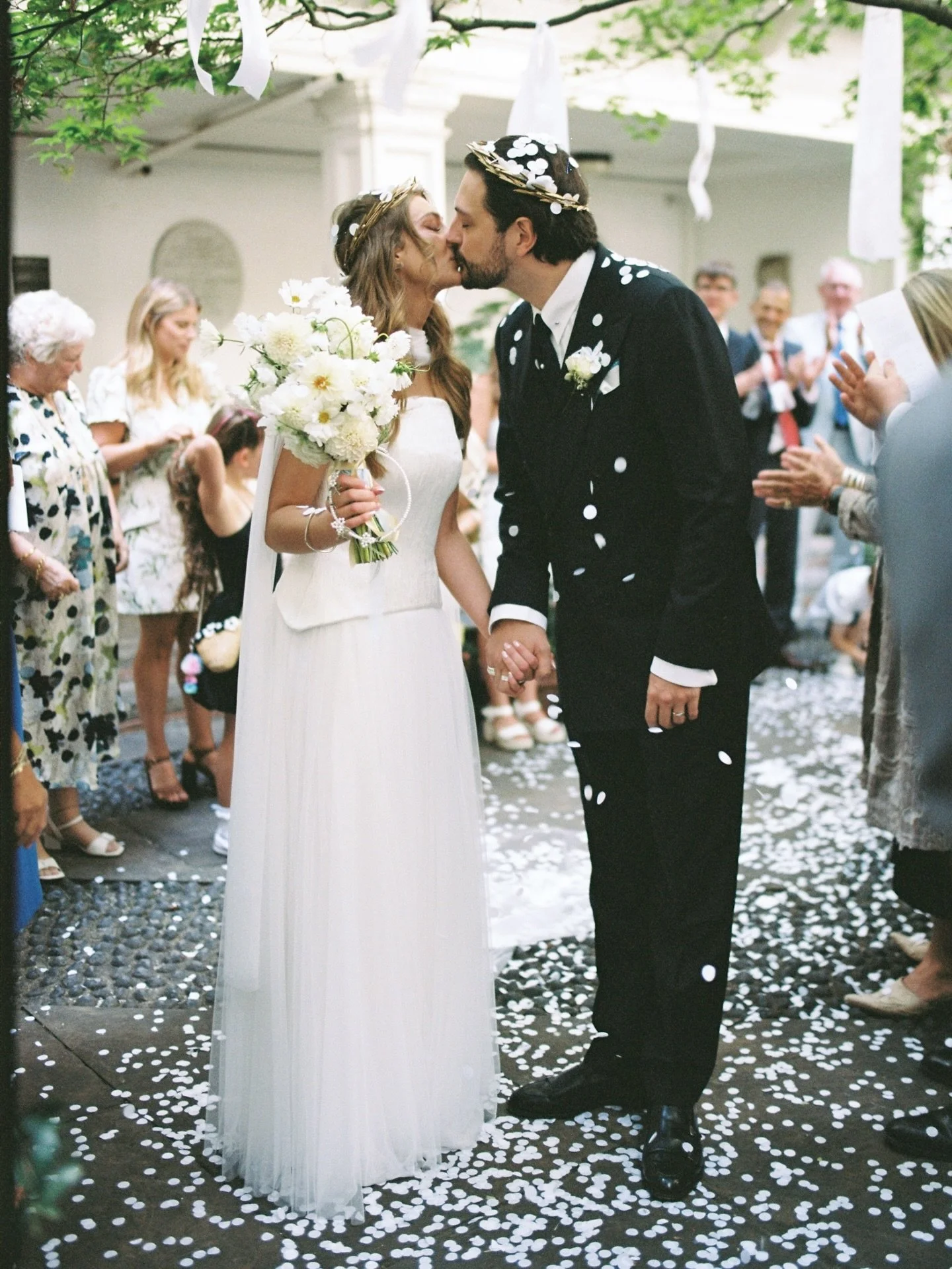 English and Greek-Cypriot wedding celebrations in the heart of London last summer, captured on 35mm and 120 film.

Film wedding photographer @sarahjoylandon 
Venue @st_vedast_alias_foster 
Florist @daisy_wanstead_flowers 
Bride @divineatelier 

#lond