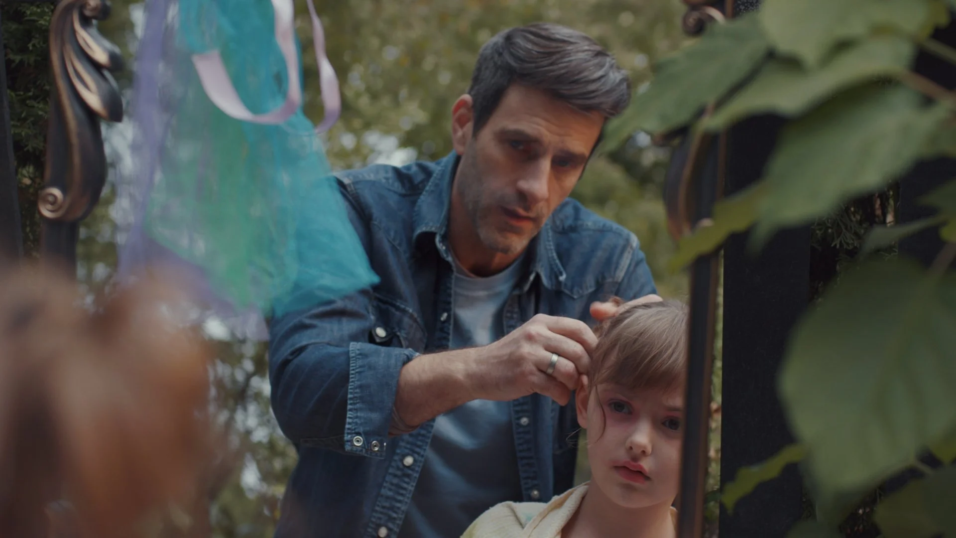 Dad gets Margaret ready for Halloween