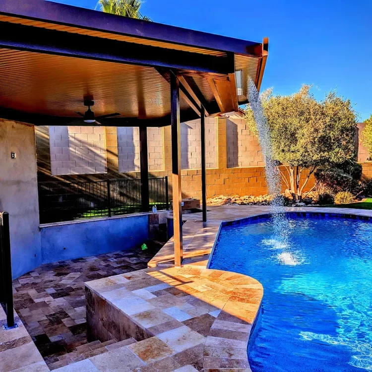 Gallery -  Swimming pool with a water-featured pergola.