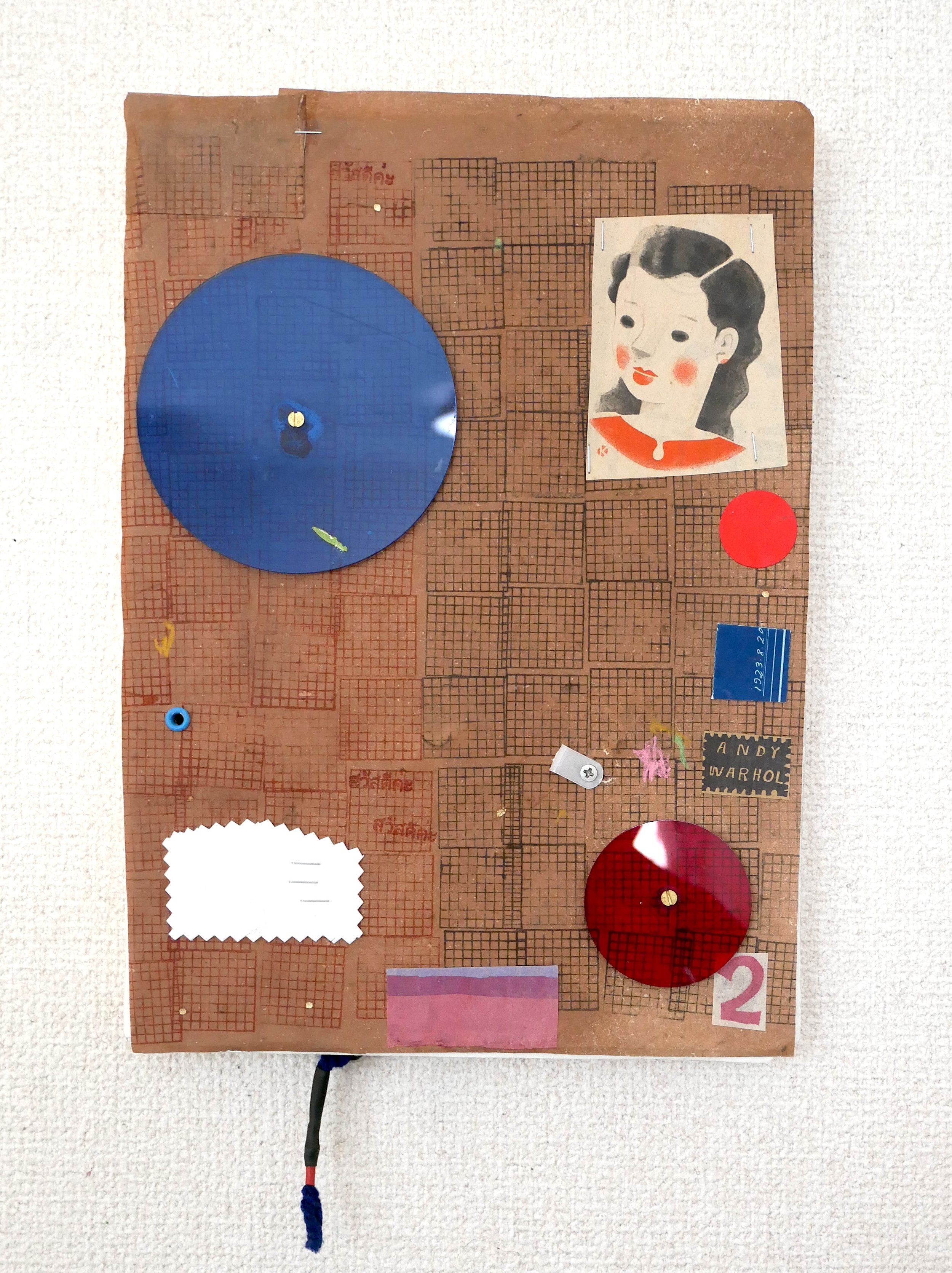TAMPOPO, 2026. Vintage Japanese dyed papers, ink, metal, plexi discs and string on thick handmade paper.  Mounted on wood panel. 22x39x2.5cm / $200.00