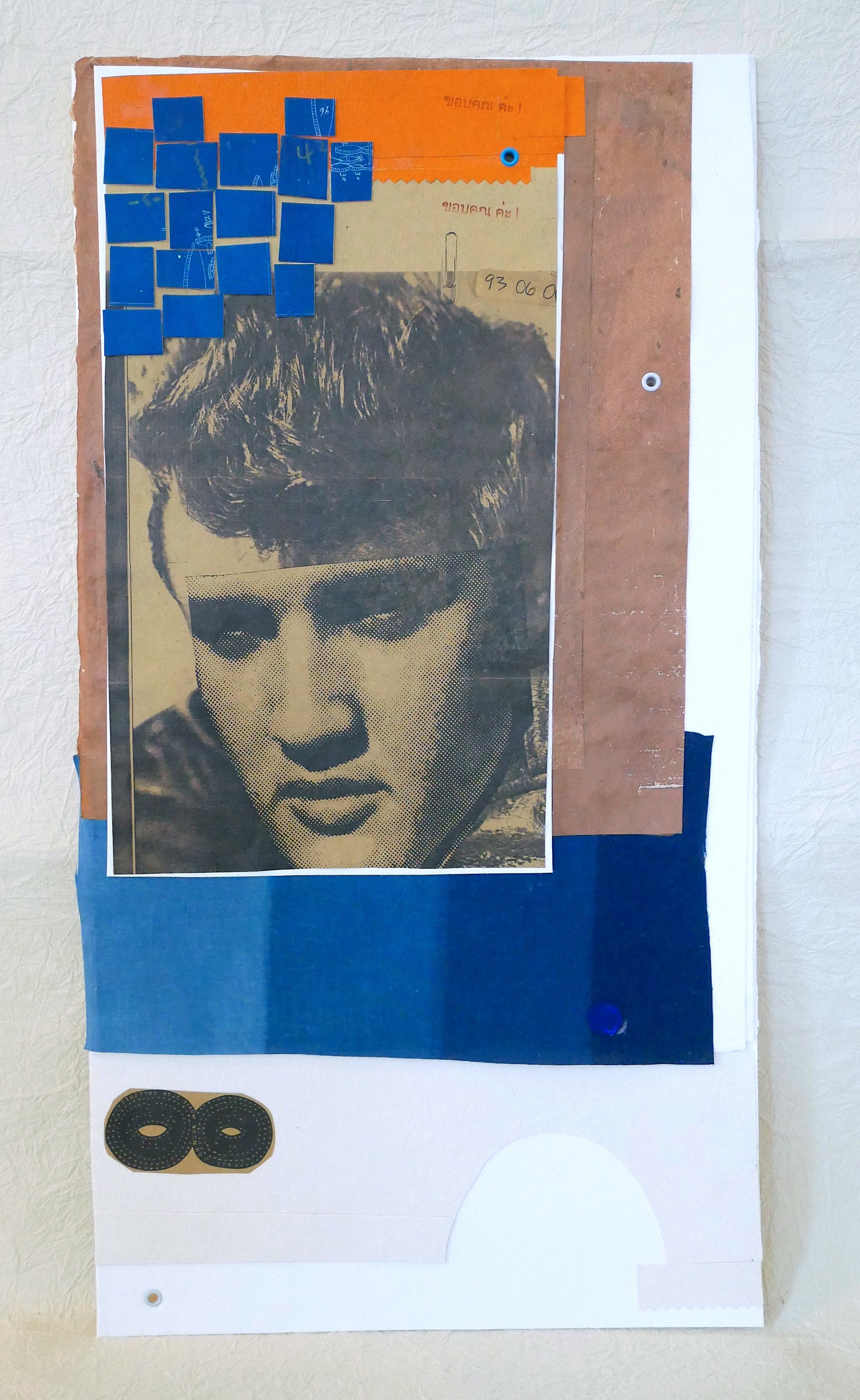 ELVIS & BLUE, 2025.  Vintage & Persimmon-dyed papers, Indigo-dyed bookcloth and eyelets on thick handmade washi paper.  29.5x55x2cm / $250