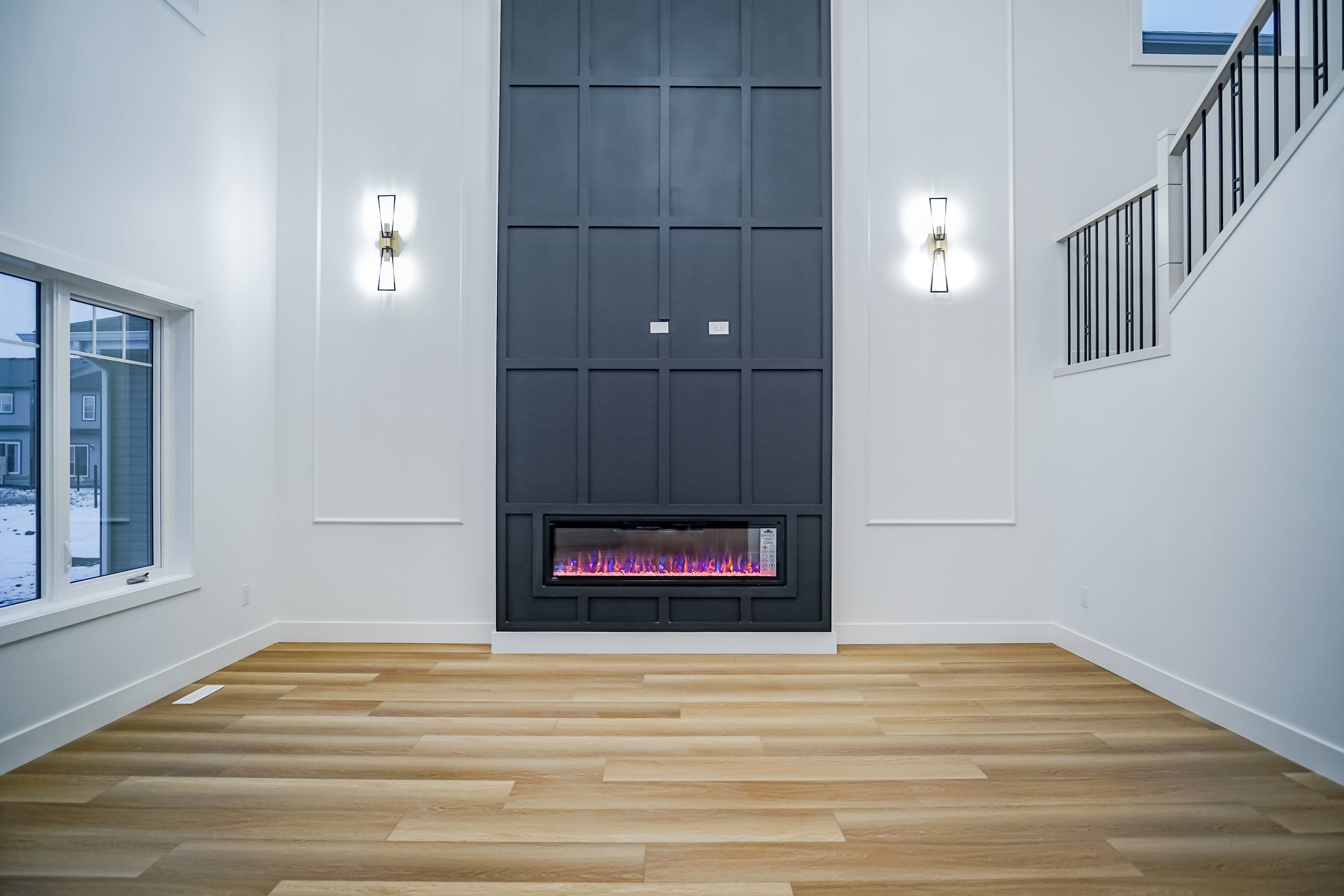 empty living room with a modern fireplace
