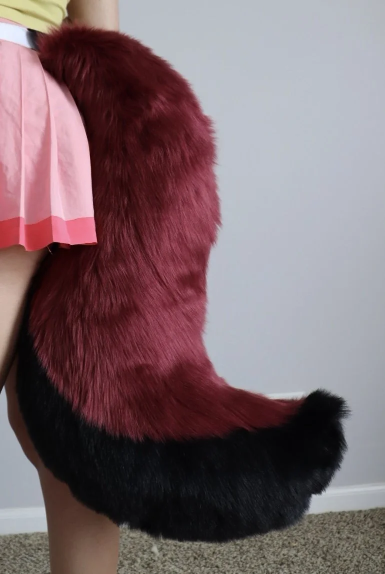 Large Maroon and Black Canine Tail
