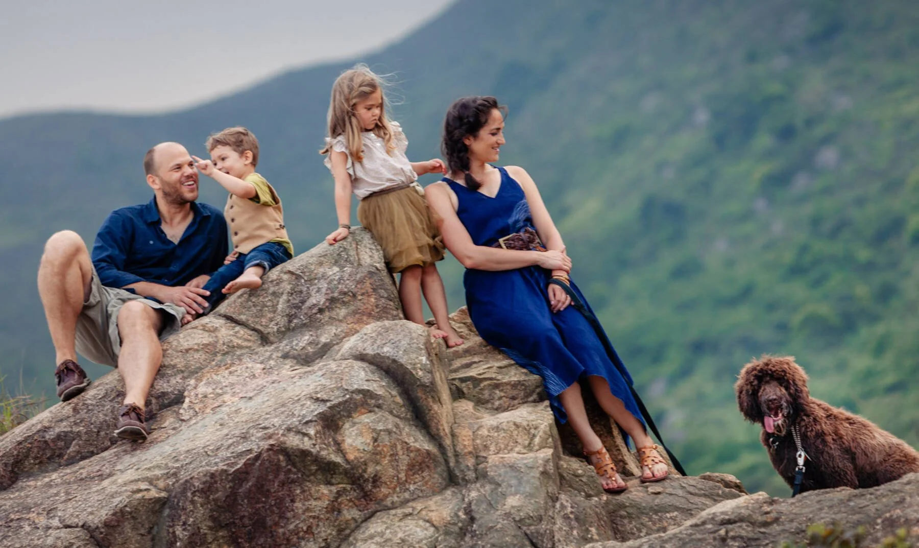 Family and pet photographer documenting a hike with their dog in Discovery Bay Hong Kong