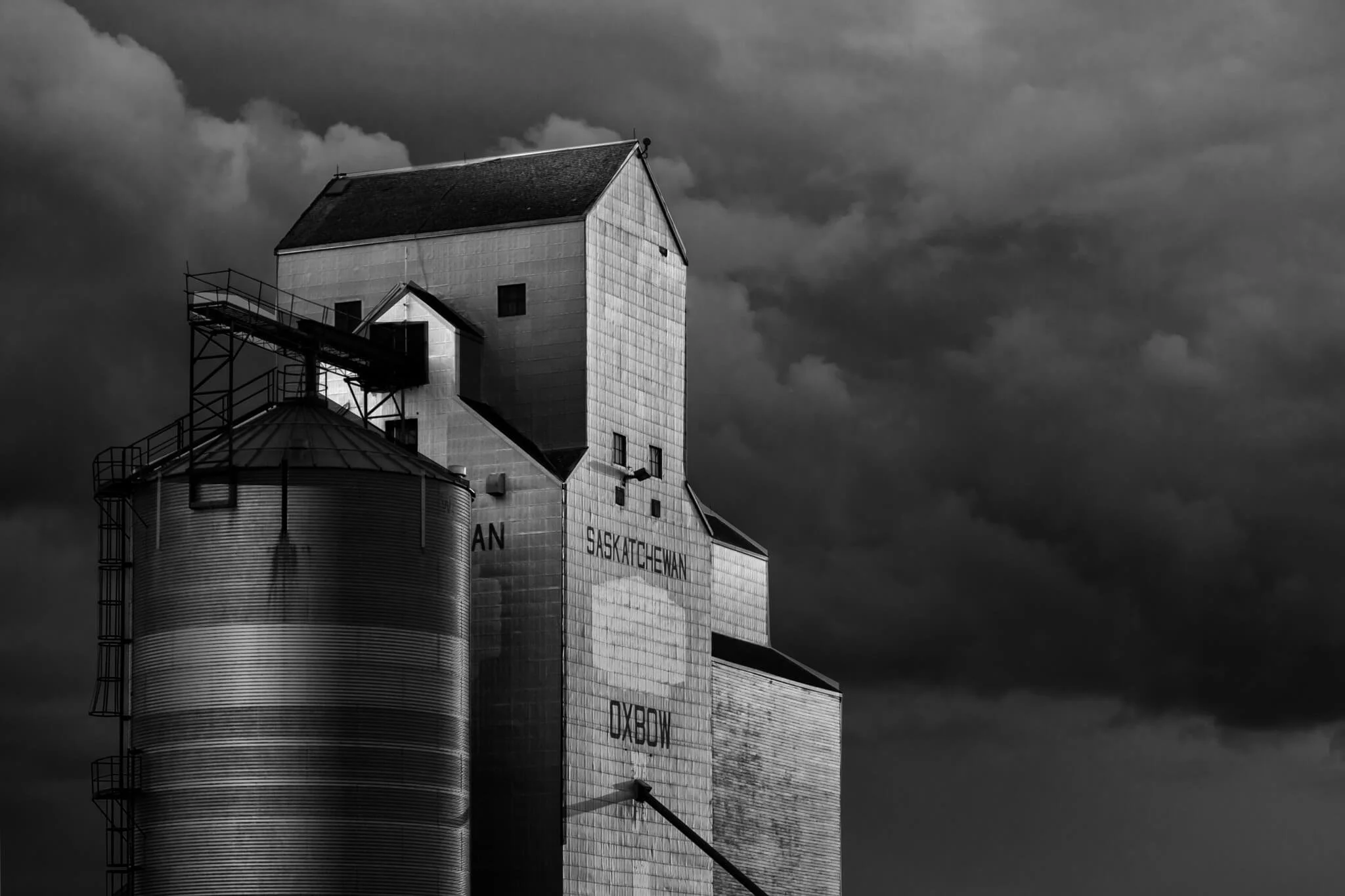 Grain elevator, Oxbow, Saskatchewan — B&W photo by HK photographer