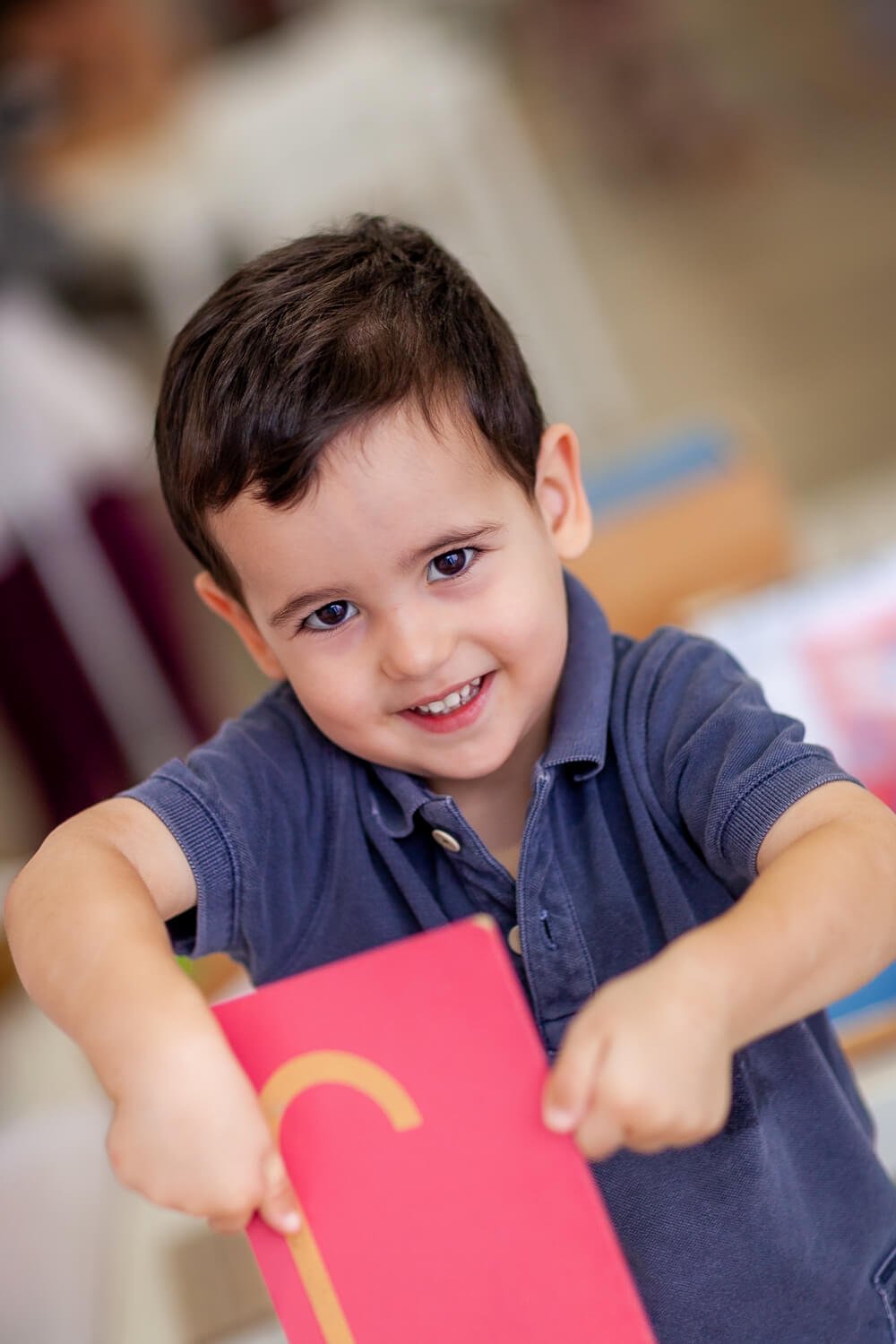 Authentic smile from a student during a documentary school photography session with Ian Taylor.