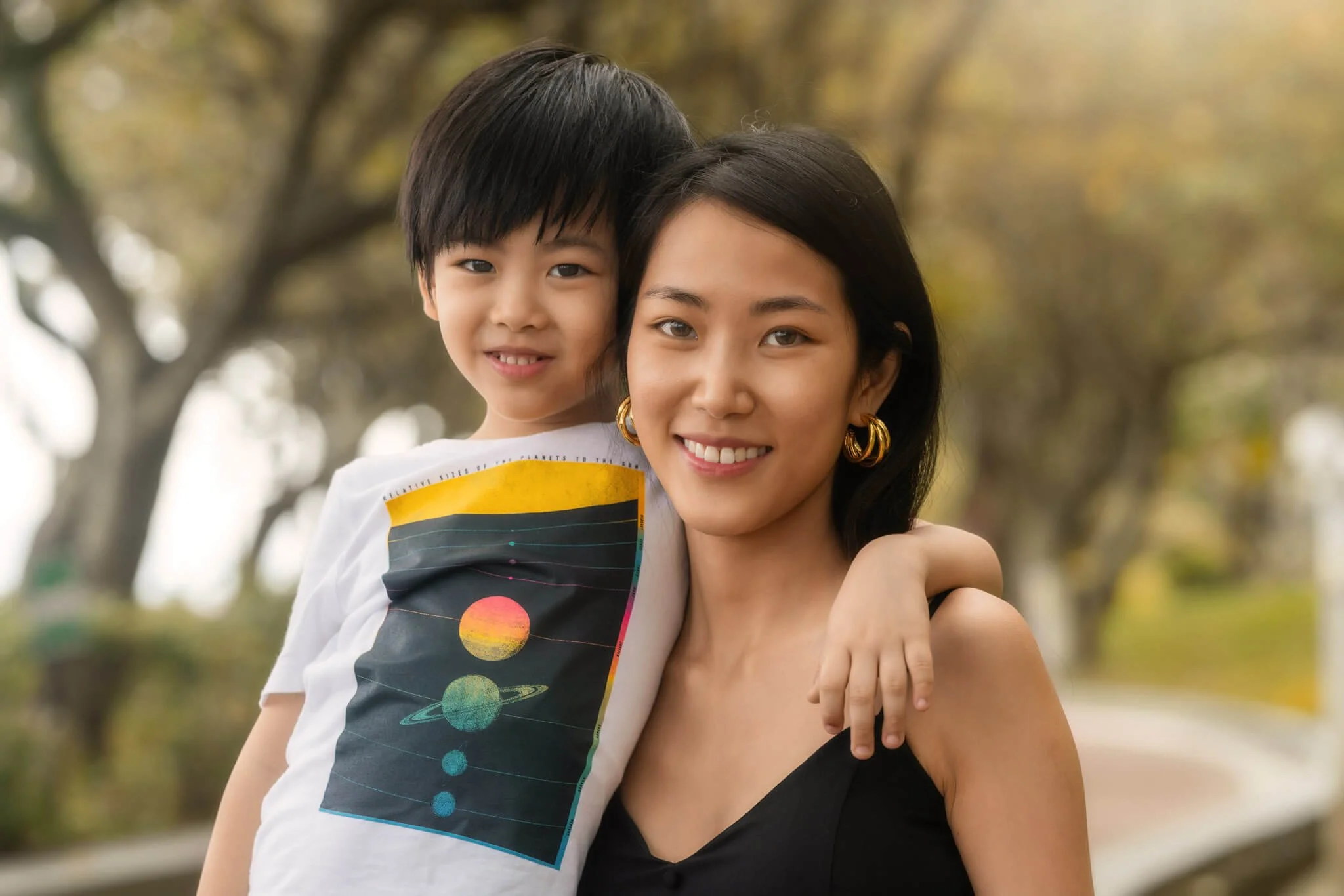 Mom and son embrace at a family photo session on Hong Kong Island