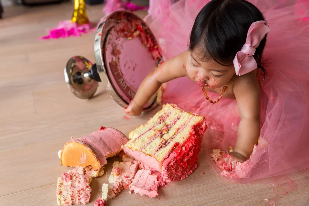 One year old smashes her birthday cake at The Peak Hong Kong