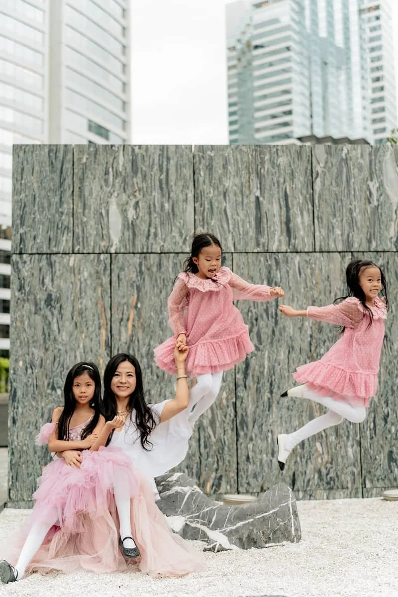 High-energy kids portrait in the rock garden at The Asia Society, Admiralty