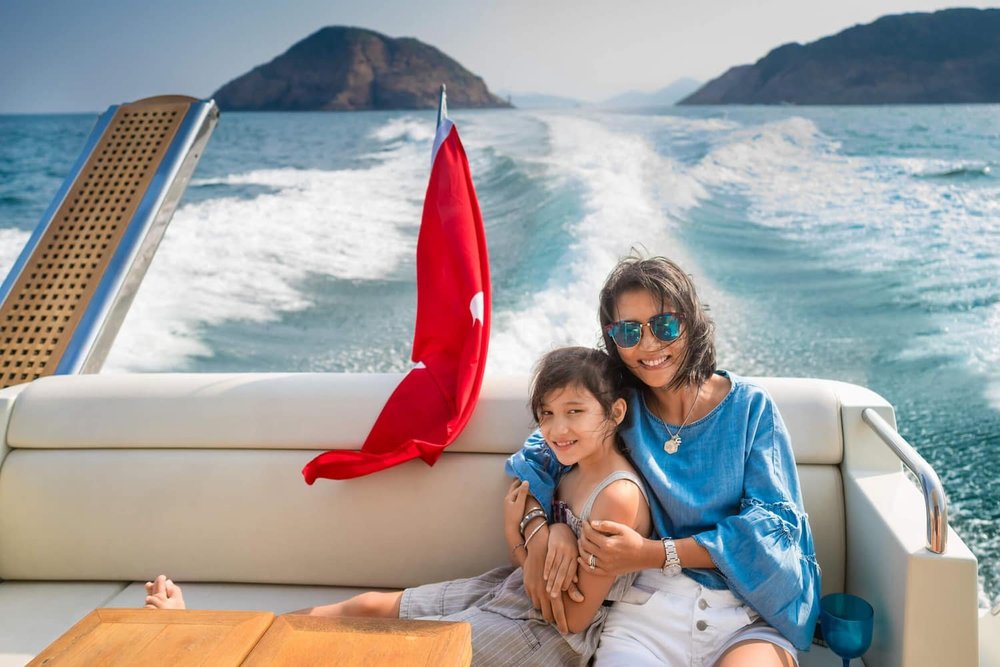 A mom and daughter out yachting in Sai Kung