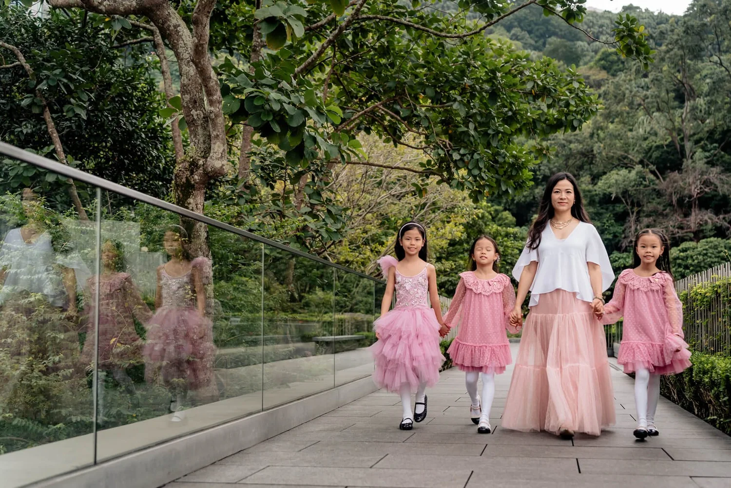 Mom and three kids at The Asia Society in Admiralty, Hong Kong