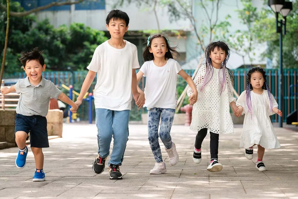 Kids running in Kowloon Park