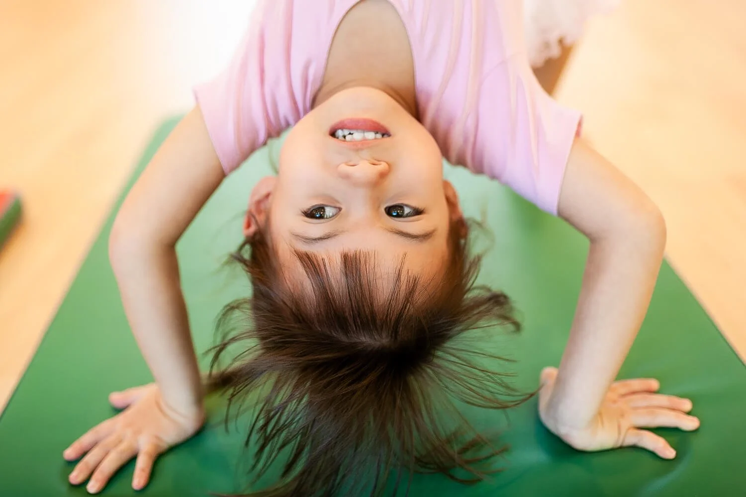 Capturing freedom of movement and physical development in a Hong Kong Montessori school; unposed photography by Ian Taylor.