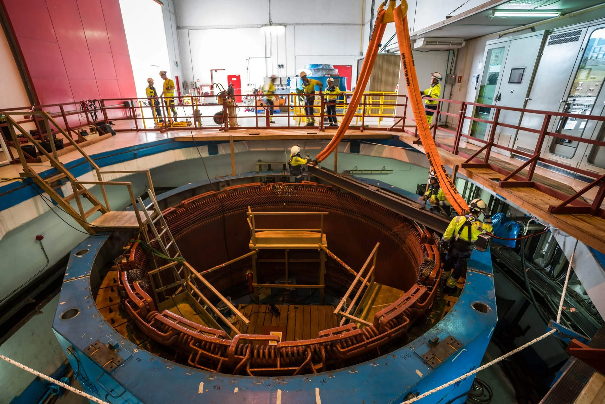 Repair on a turbine for Theun-Hinboun Power Company. Industrial photography.
