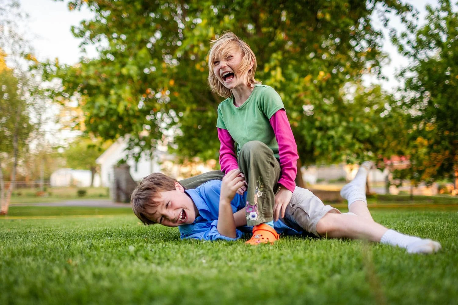cousins-playing-on-the-grass.jpg