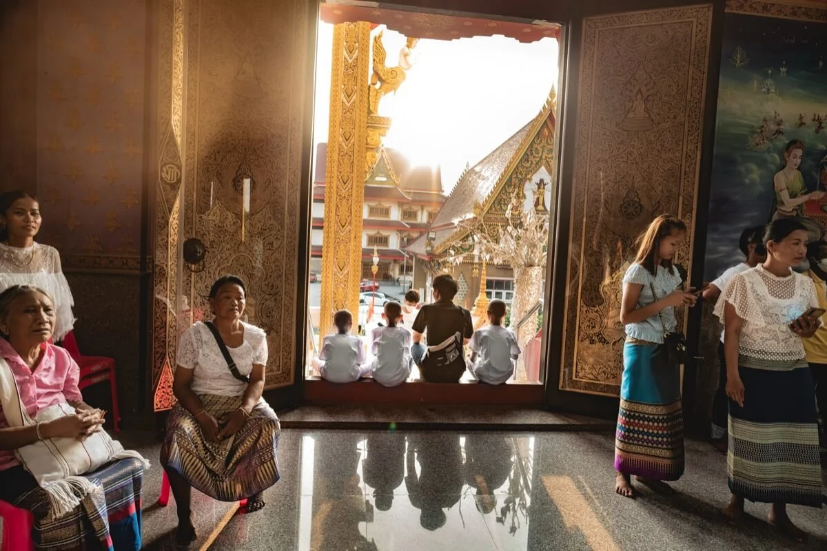 People sitting at Wat Sala Daeng