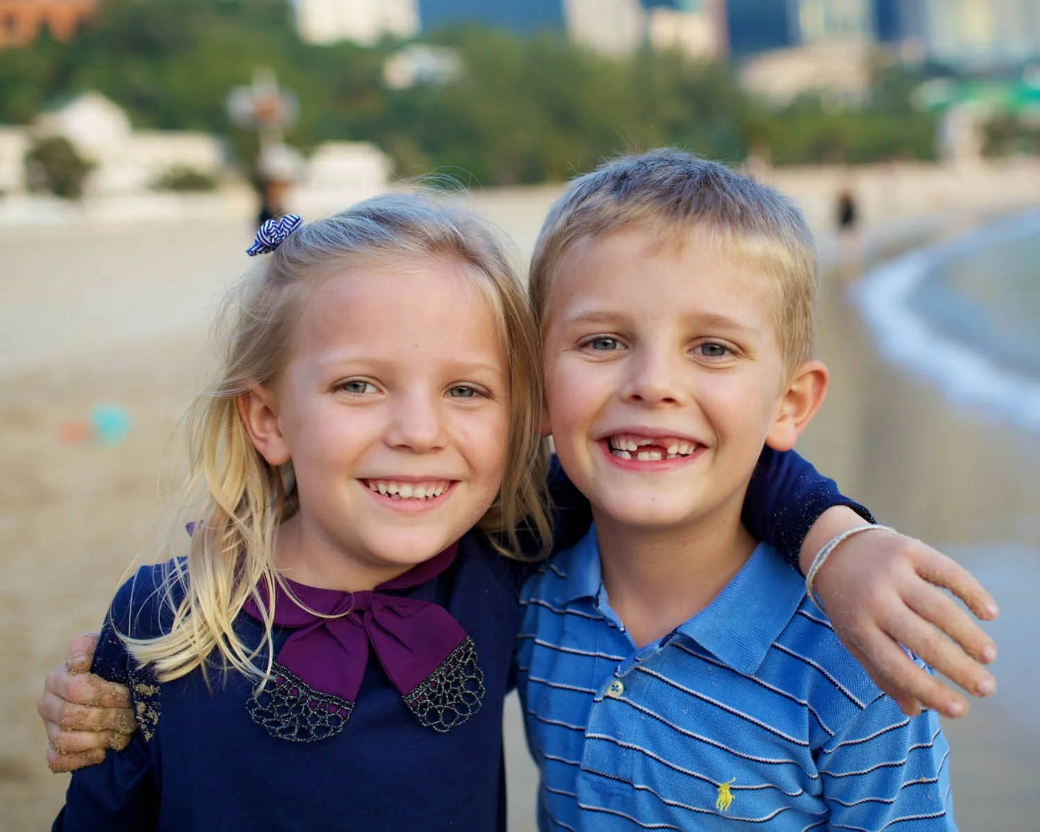 Brother and sister embrace during a photoshoot on Repulse Bay Hong Kong.