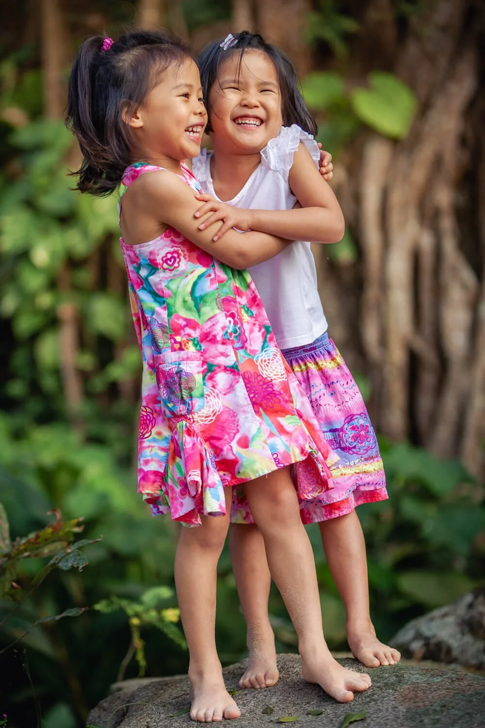 Sisters in perfect late-afternoon beach light.