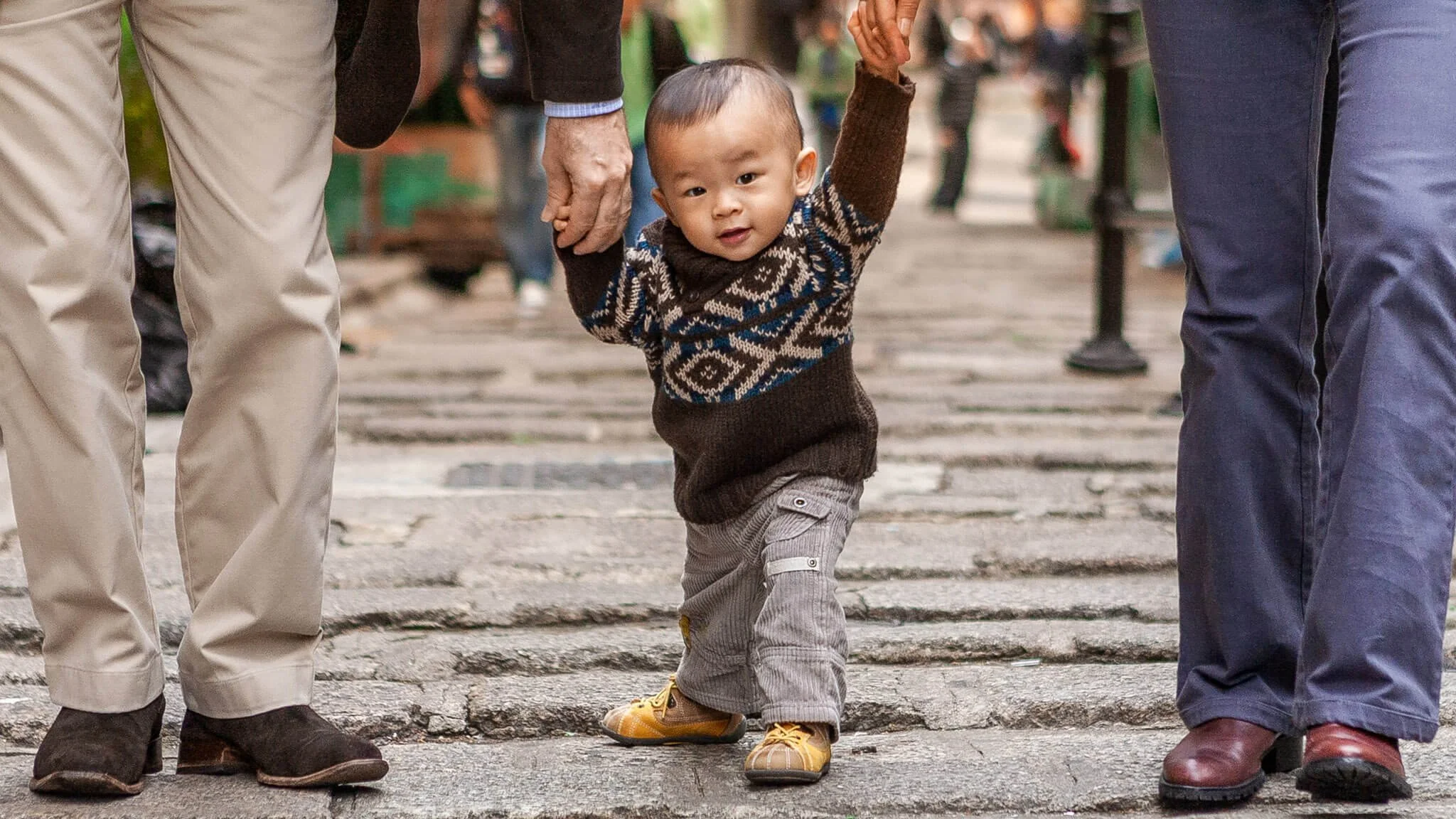 Boy on Pottinger Street during a holiday photo shoot in Hong Kong