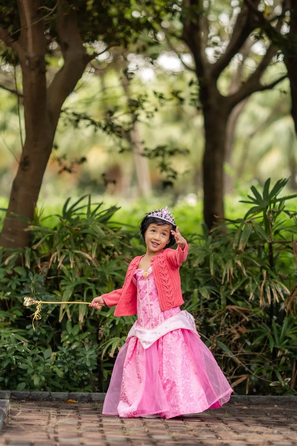 A girl plays as a princess on a Hong Kong kids photo session in Tung Chung