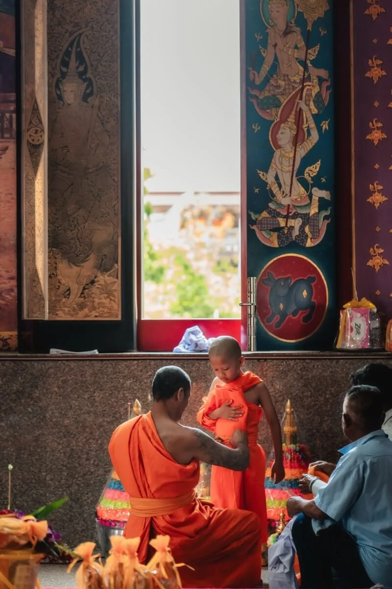 Lua boy dressed in his first Buddhist robes