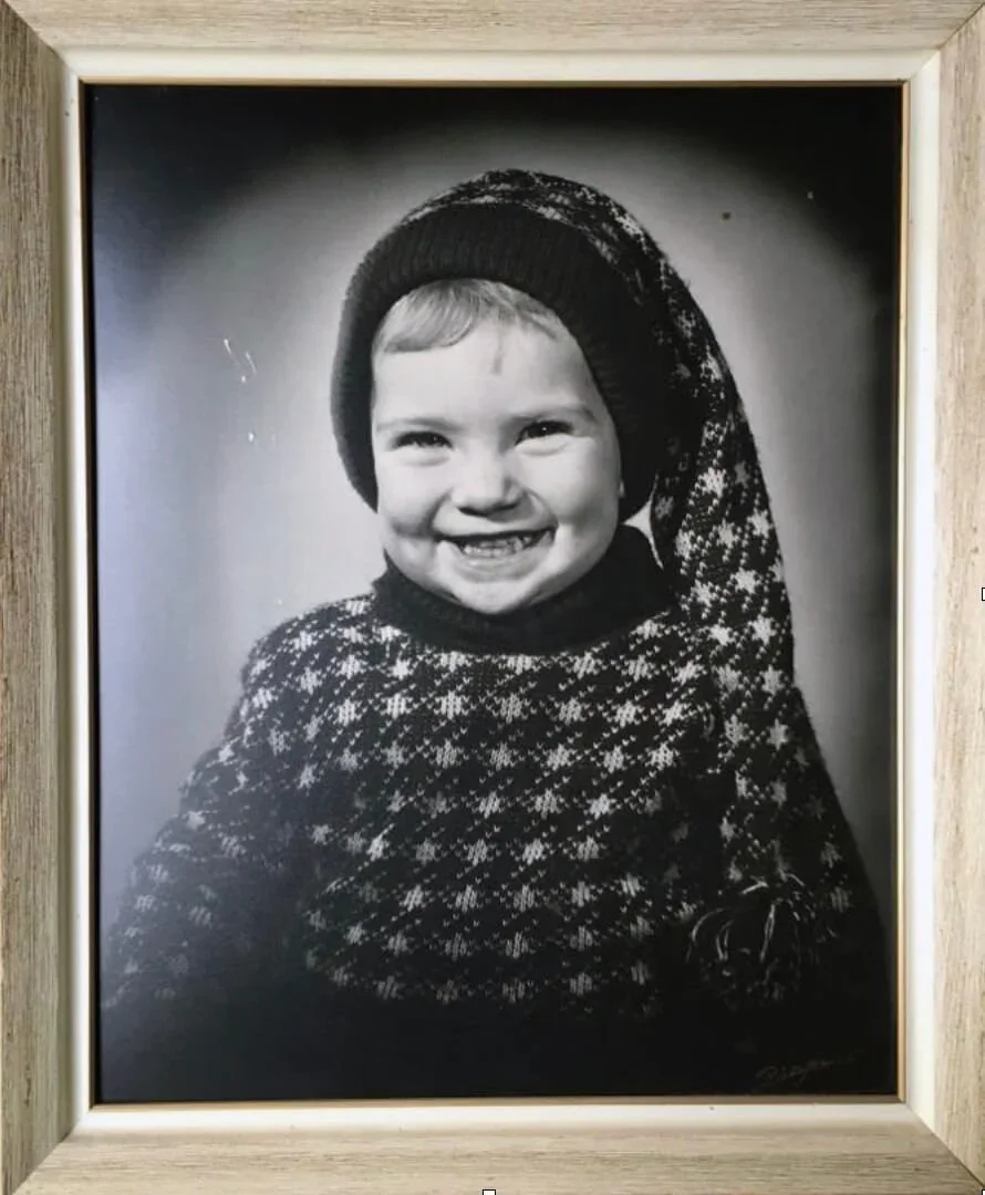 This photo of my sister was in the window of the studio in my hometown for years.
