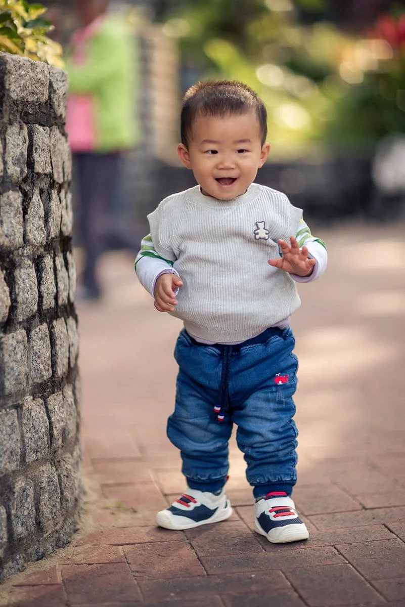 Toddler takes first steps at Repulse Bay Beach, HK