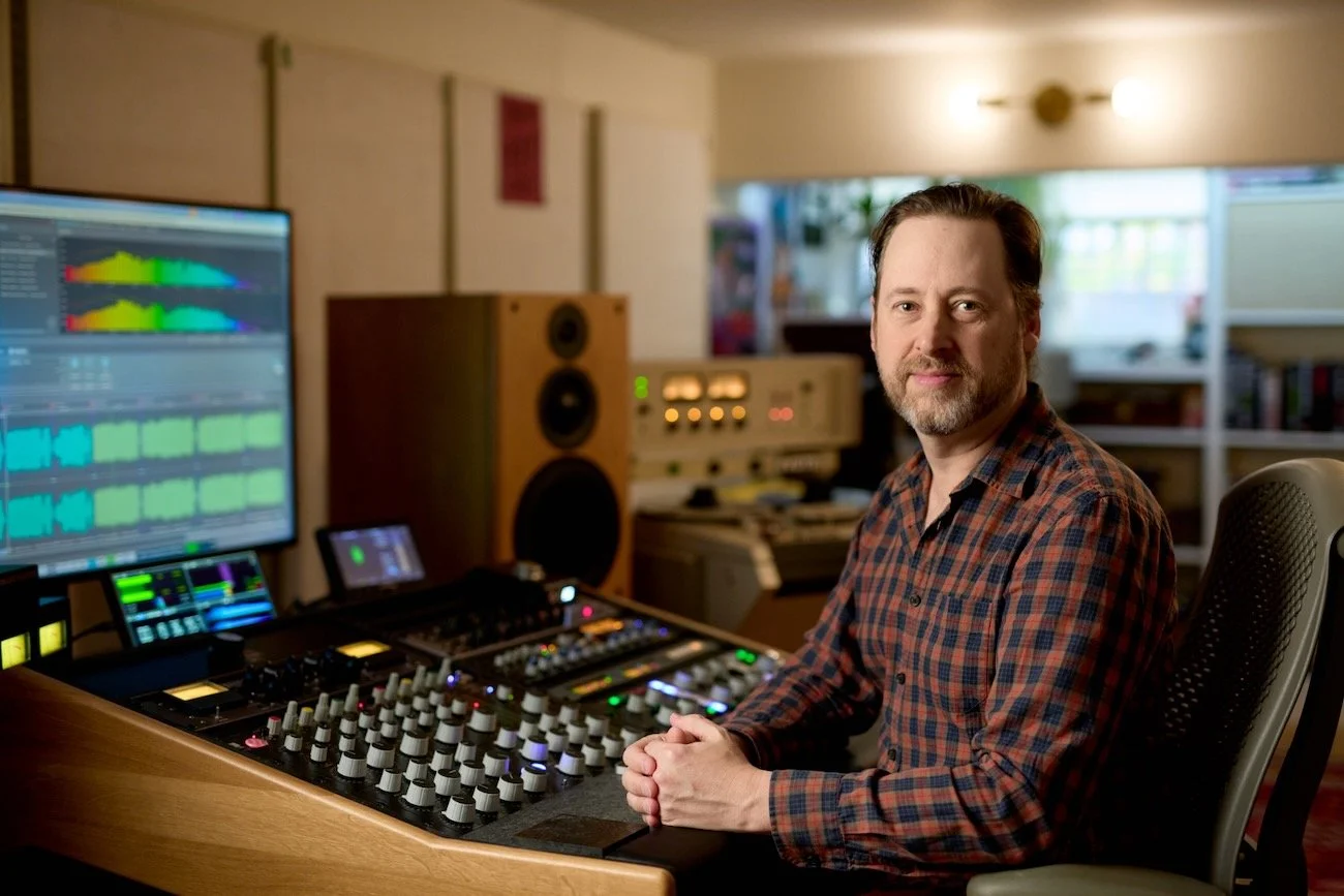Mat Leffler-Schulman. a mastering engineer,  at his mastering desk / studio in front of the WaveLab Pro DAW on the screen.