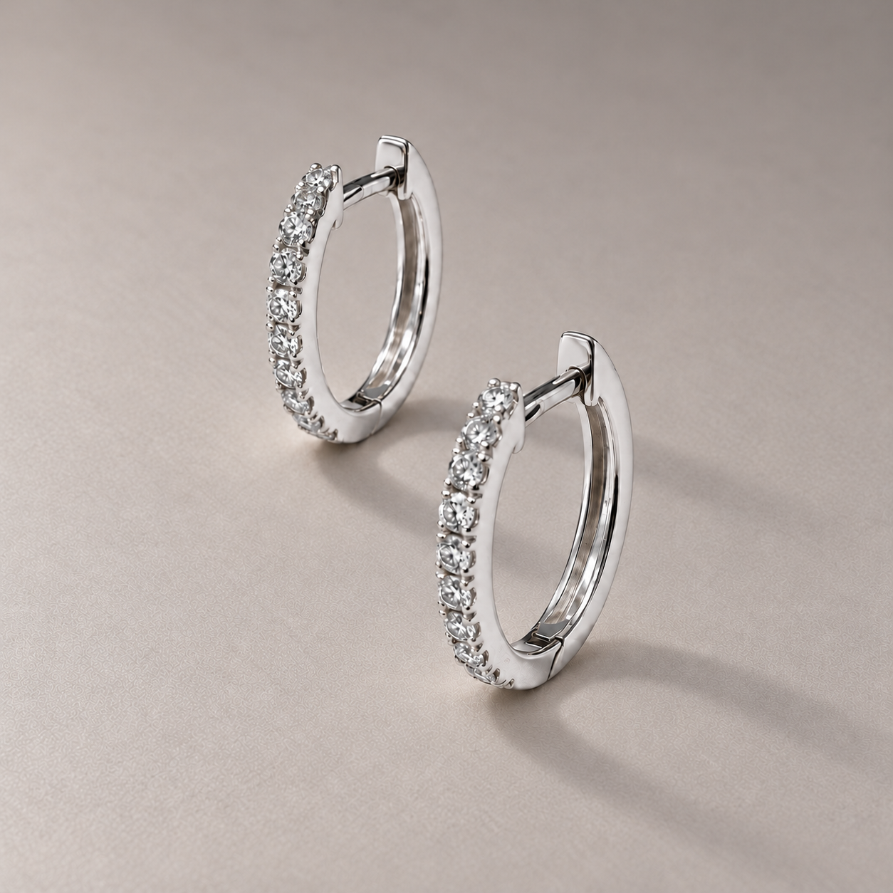 Polished white gold diamond earrings-2.png